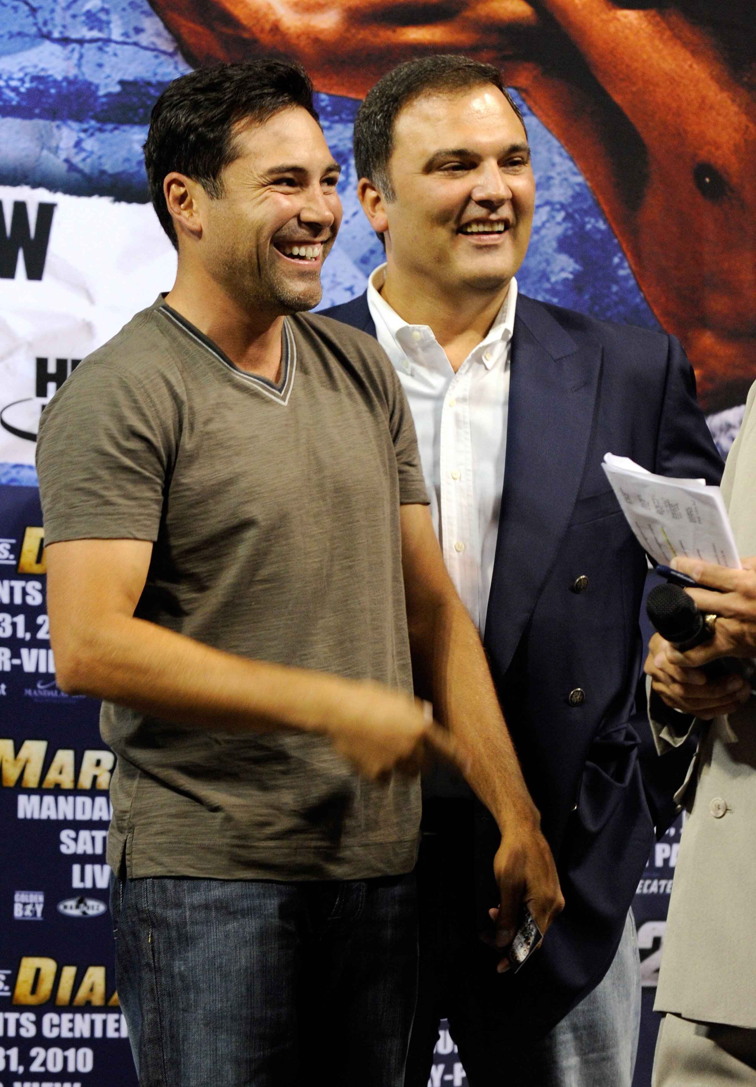 LAS VEGAS - JULY 30:  Golden Boy Promotions President Oscar De La Hoya (L) and CEO of Golden Boy Promotions Richard Schaefer appear during the official weigh-in for WBA/WBO lightweight champion Juan Manuel Marquez and Juan Diaz at the Mandalay Bay Events