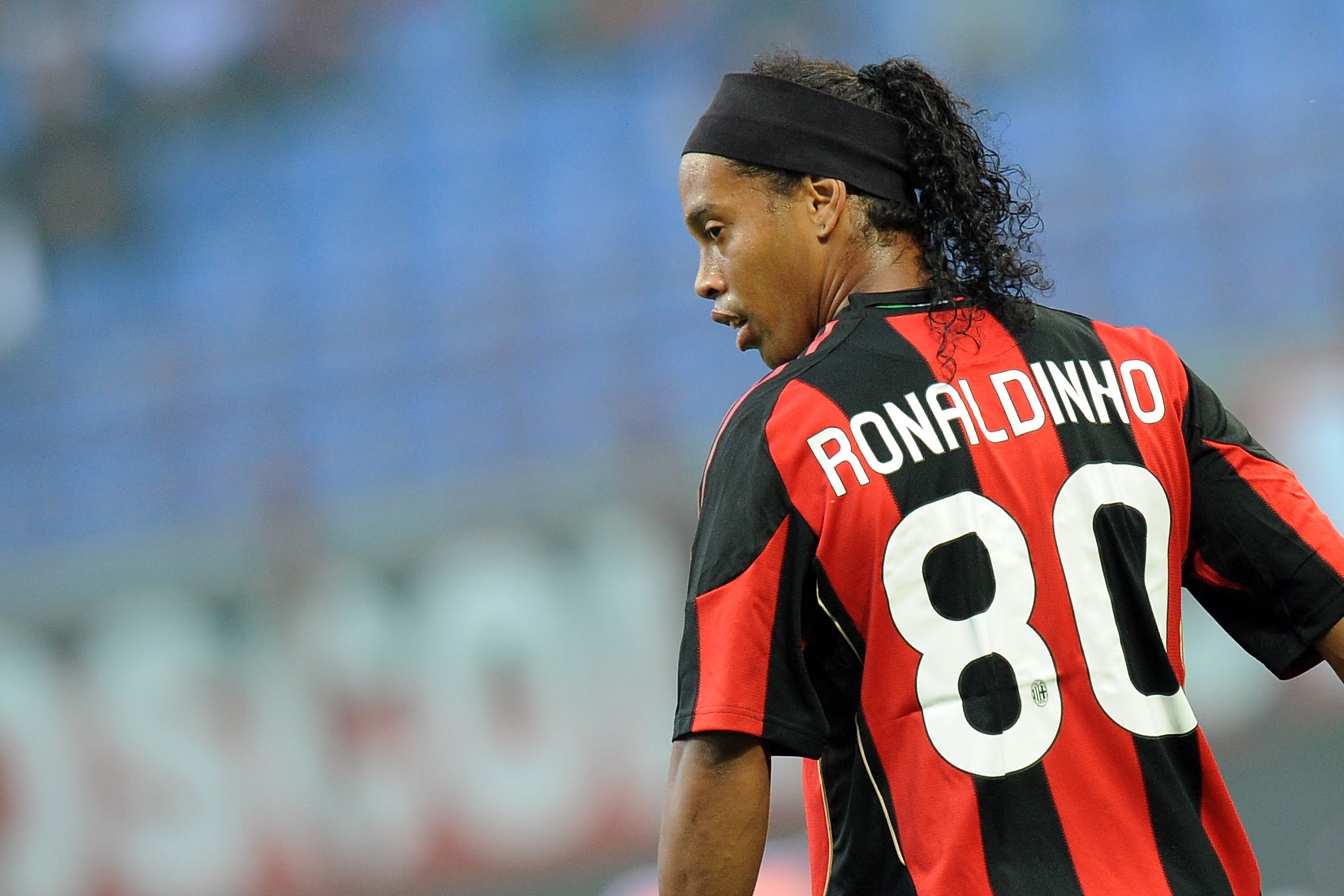 MILAN, ITALY - SEPTEMBER 26:  Ronaldinho of Milan looks on during the Serie A match between AC Milan and Genoa CFC at Stadio Giuseppe Meazza on September 26, 2010 in Milan, Italy.  (Photo by Tullio M. Puglia/Getty Images)