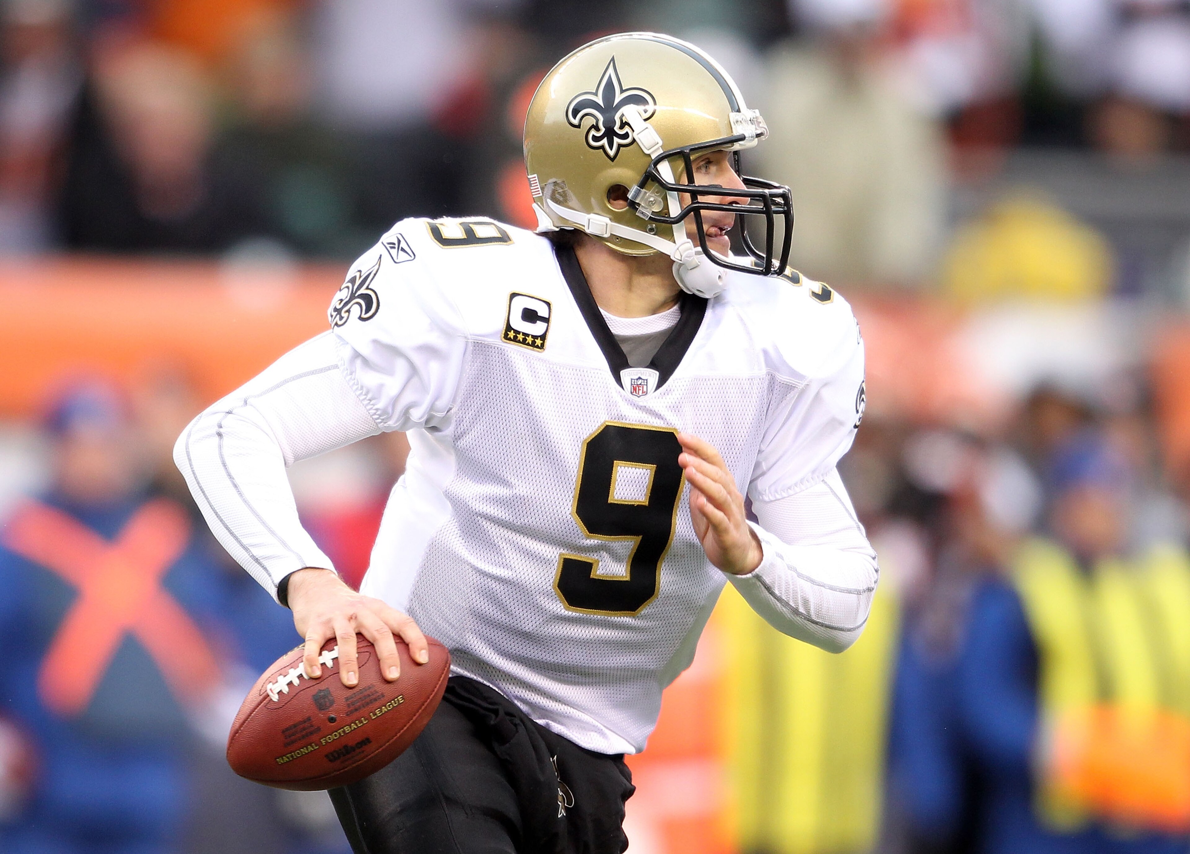 CINCINNATI, OH - DECEMBER 05:  Dree Brees #9 of the New Orleans Saints looks to throw a pass during the NFL game against the Cincinnati Bengals at Paul Brown Stadium on December 5, 2010 in Cincinnati, Ohio.  The Saints won 34-30.  (Photo by Andy Lyons/Get