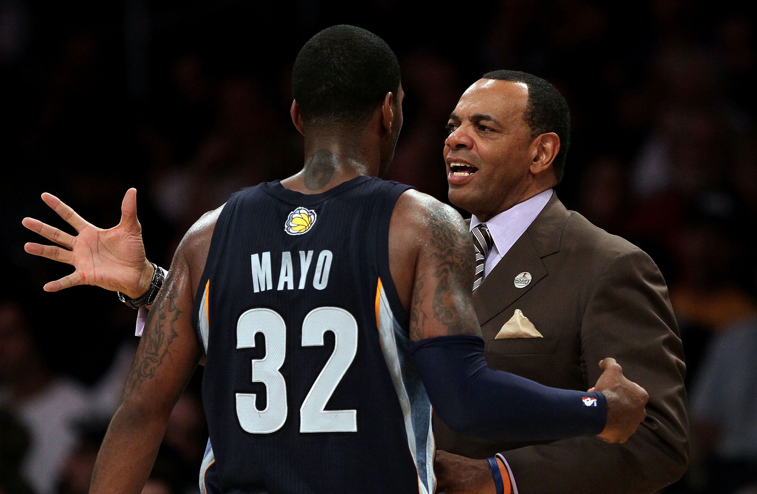 LOS ANGELES, CA - NOVEMBER 02:  Head coach Lionel Hollins of the Memphis Grizzlies talks to O.J. Mayo #32 in the game against the Los Angeles Lakers at Staples Center on November 2, 2010 in Los Angeles, California. The Lakers defeated the Grizzlies 124-10