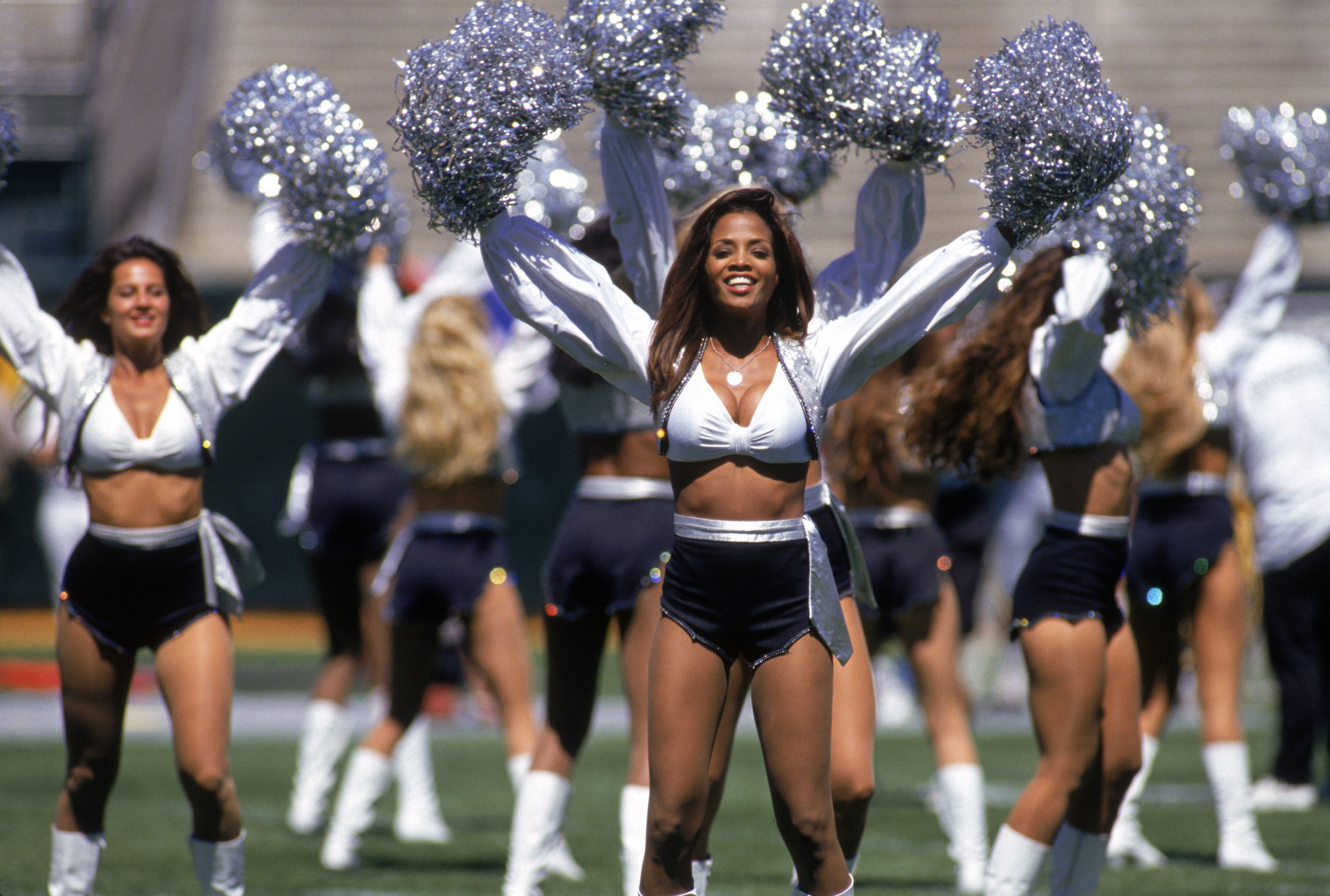 OAKLAND, CA - SEPTEMBER 3:  The Raiderettes cheerleaders perform during a game between the San Diego Chargers and the Oakland Raiders at the Oakland/Alameda County Coliseum on September 3, 1995 in Oakland, California.  The Raiders won 17-7.  (Photo by Geo