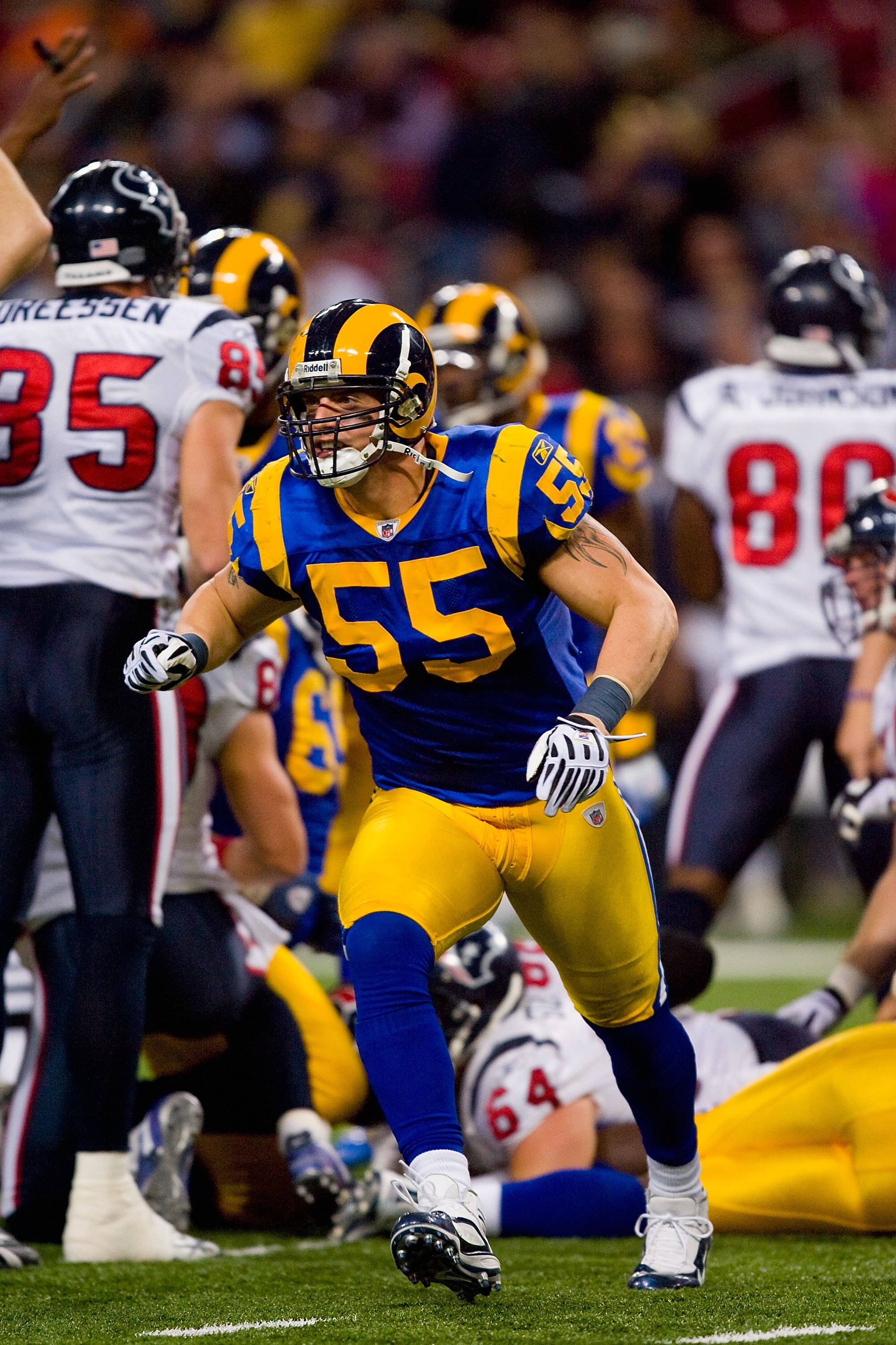ST. LOUIS - DECEMBER 20:  James Laurinaitis #59 of the St. Louis Rams reacts to a play during the game against the Houston Texans at Edward Jones Dome on December 20, 2009 in St. Louis, Missouri.  (Photo by Dilip Vishwanat/Getty Images)
