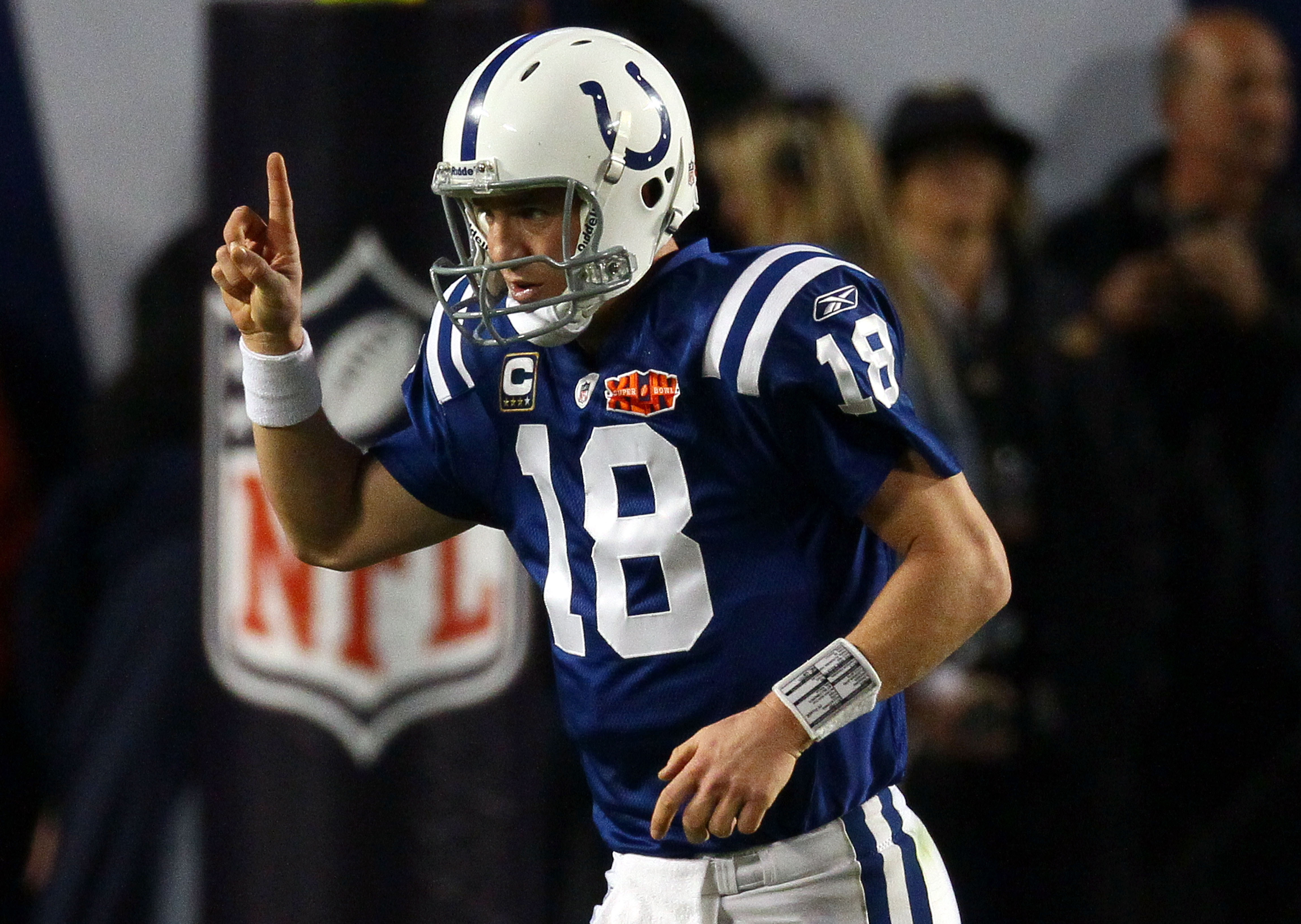 MIAMI GARDENS, FL - FEBRUARY 07: Peyton Manning #18 of the Indianapolis Colts celebrates after a touchdown in the third quarter against the New Orleans Saints during Super Bowl XLIV on February 7, 2010 at Sun Life Stadium in Miami Gardens, Florida.  (Phot