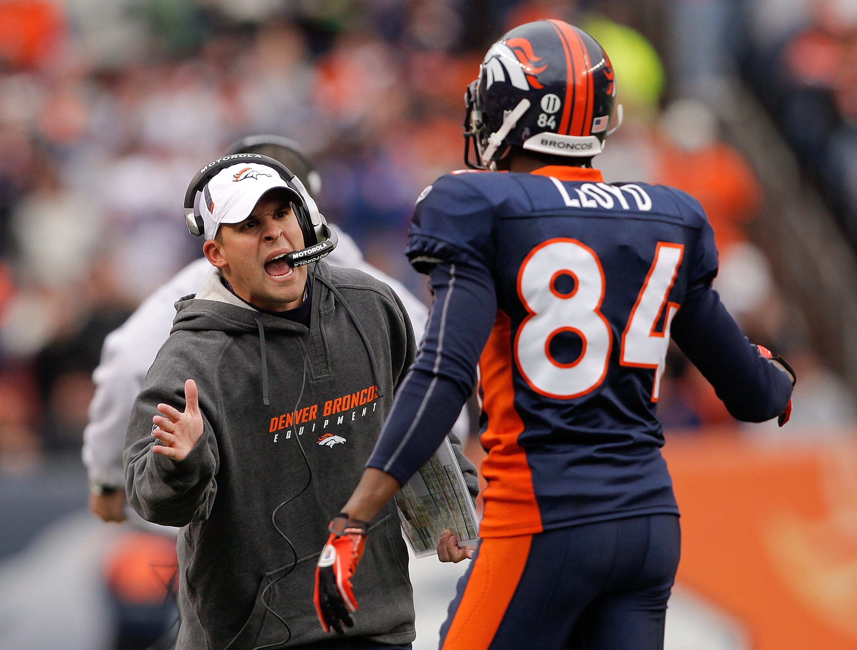 DENVER - NOVEMBER 28:  Head coach Josh McDaniels of the Denver Broncos celebrates a touchdown by Knowshon Moreno with wide receiver Brandon Lloyd #84 against the St. Louis Rams at INVESCO Field at Mile High on November 28, 2010 in Denver, Colorado. The Ra