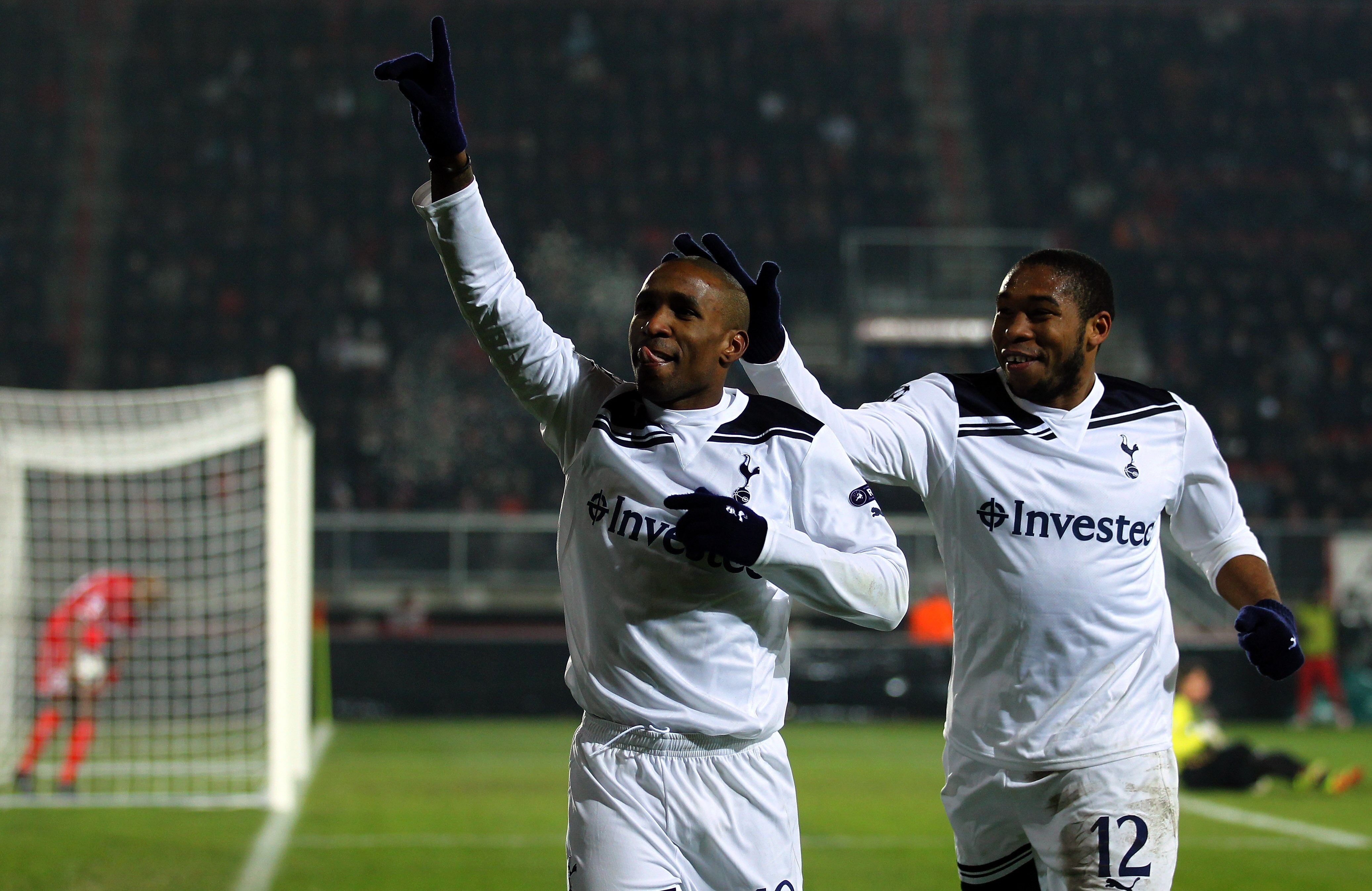 ENSCHEDE, NETHERLANDS - DECEMBER 07:  Jermain Defoe of Tottenham celebrates with team mate Wilson Palacios after scoring his teams third goal during the UEFA Champions League Group A match between FC Twente and Tottenham Hotspur at FC Twente stadium on De