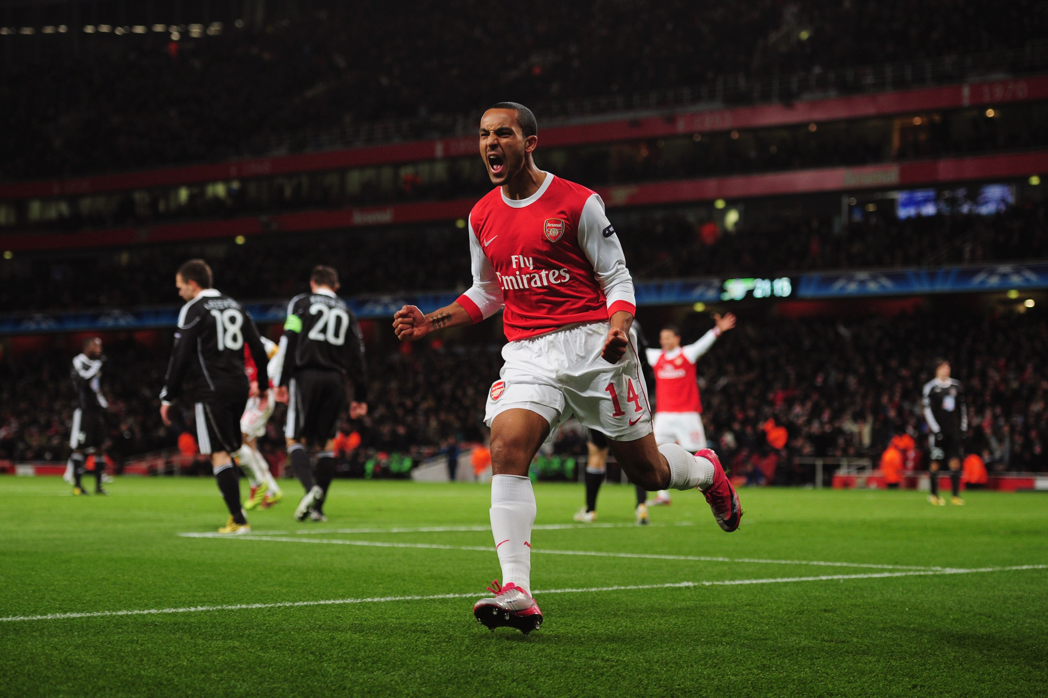 LONDON, ENGLAND - DECEMBER 08:  Theo Walcott of Arsenal celebrates as he scores their second goal during the UEFA Champions League Group H match between Arsenal and FK Partizan Belgrade at the Emirates Stadium on December 8, 2010 in London, England.  (Pho