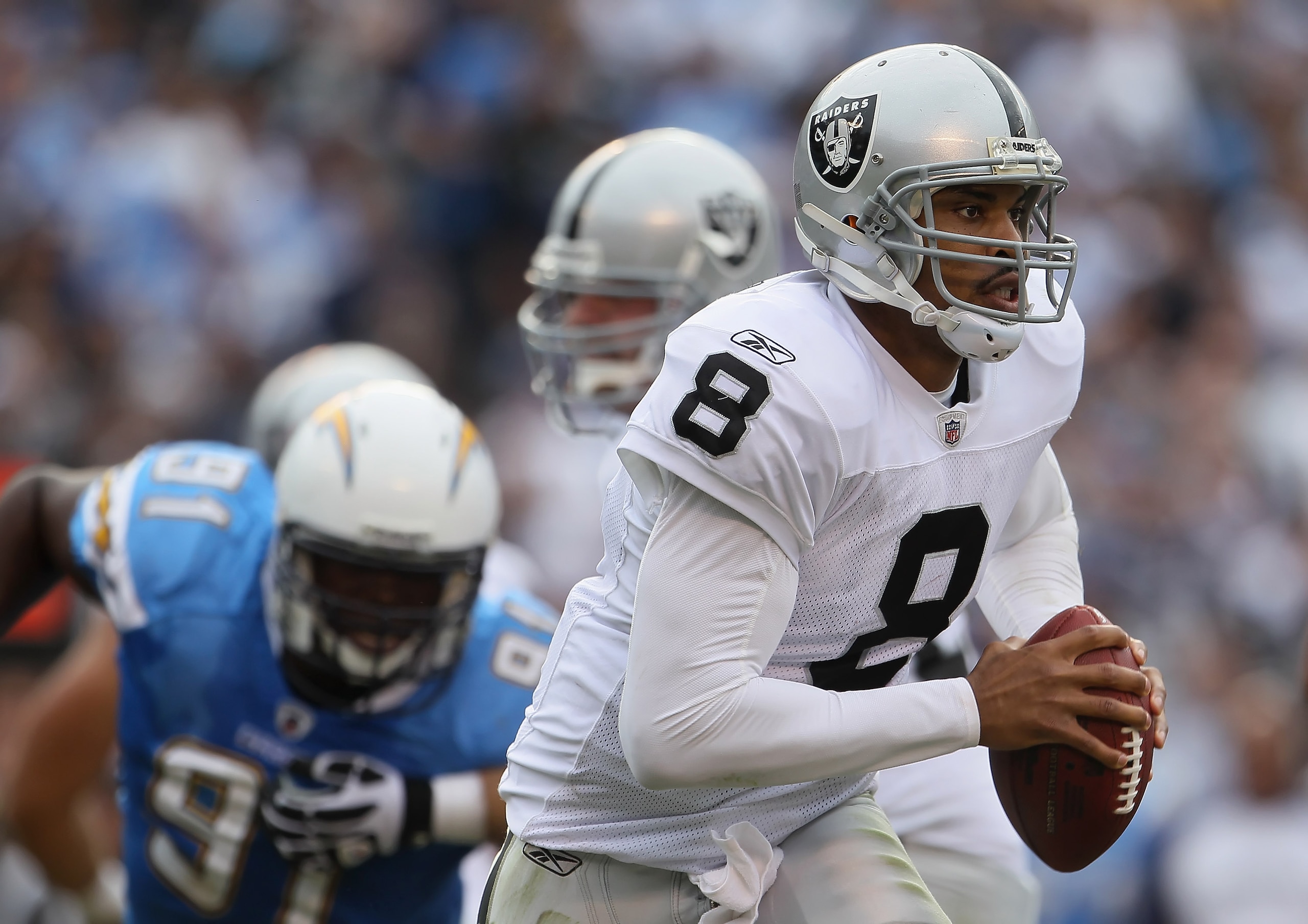 SAN DIEGO - DECEMBER 05: Quarterback Jason Campbell #8 the Oakland Raiders scrambles out of the pocket against the San Diego Chargers during the second quarter at Qualcomm Stadium on December 5, 2010 in San Diego, California. The Raiders defeated the Cha SAN DIEGO - DECEMBER 05: Quarterback Jason Campbell #8 the Oakland Raiders scrambles out of the pocket against the San Diego Chargers during the second quarter at Qualcomm Stadium on December 5, 2010 in San Diego, California. The Raiders defeated the Cha