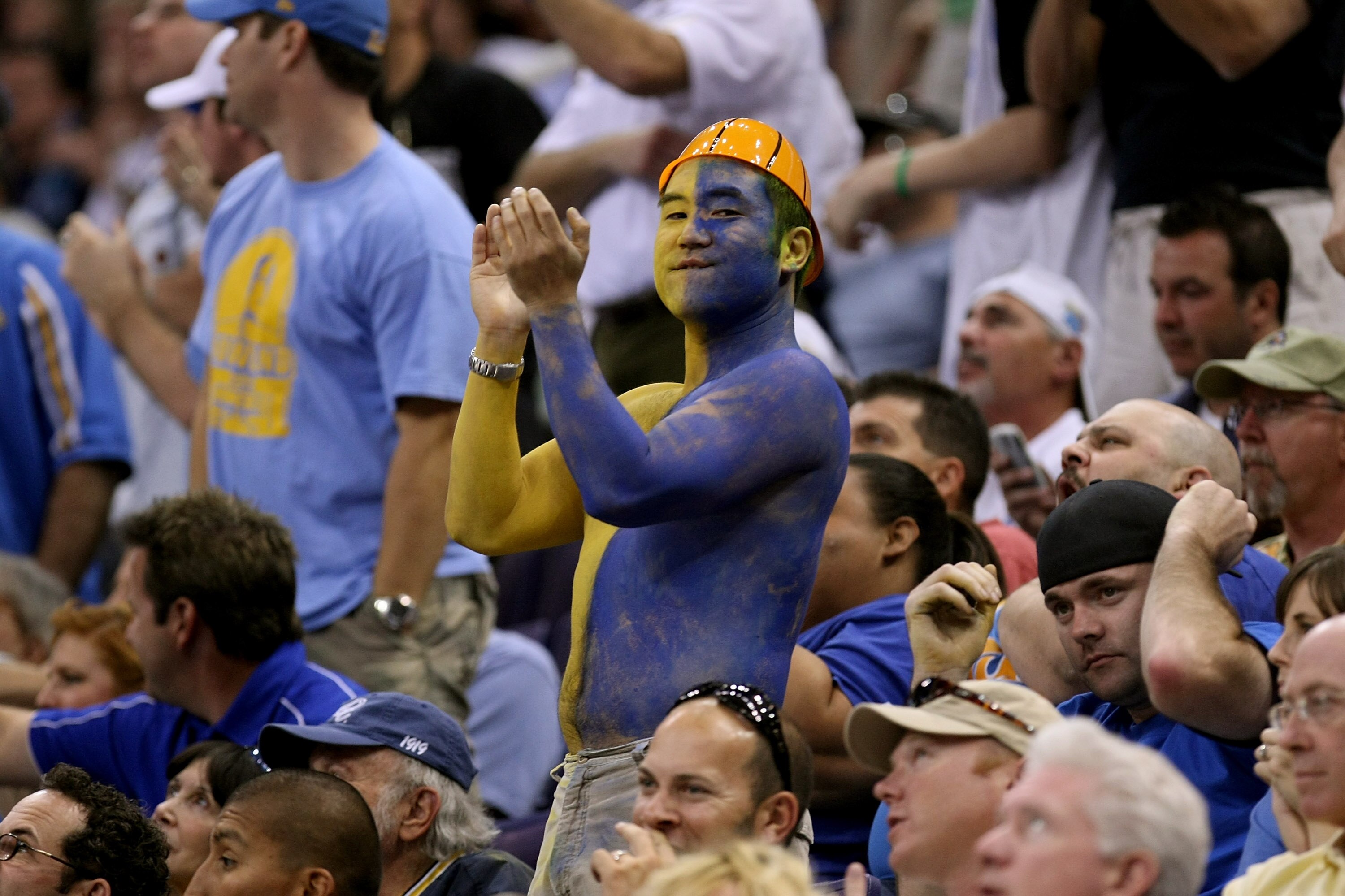 PHOENIX - MARCH 29:  A UCLA Bruins fan cheers on his team during the West Regional Final against Xavier Musketeers at the U.S. Airways Center on March 29, 2008 in Phoenix, Arizona.  (Photo by Stephen Dunn/Getty Images)