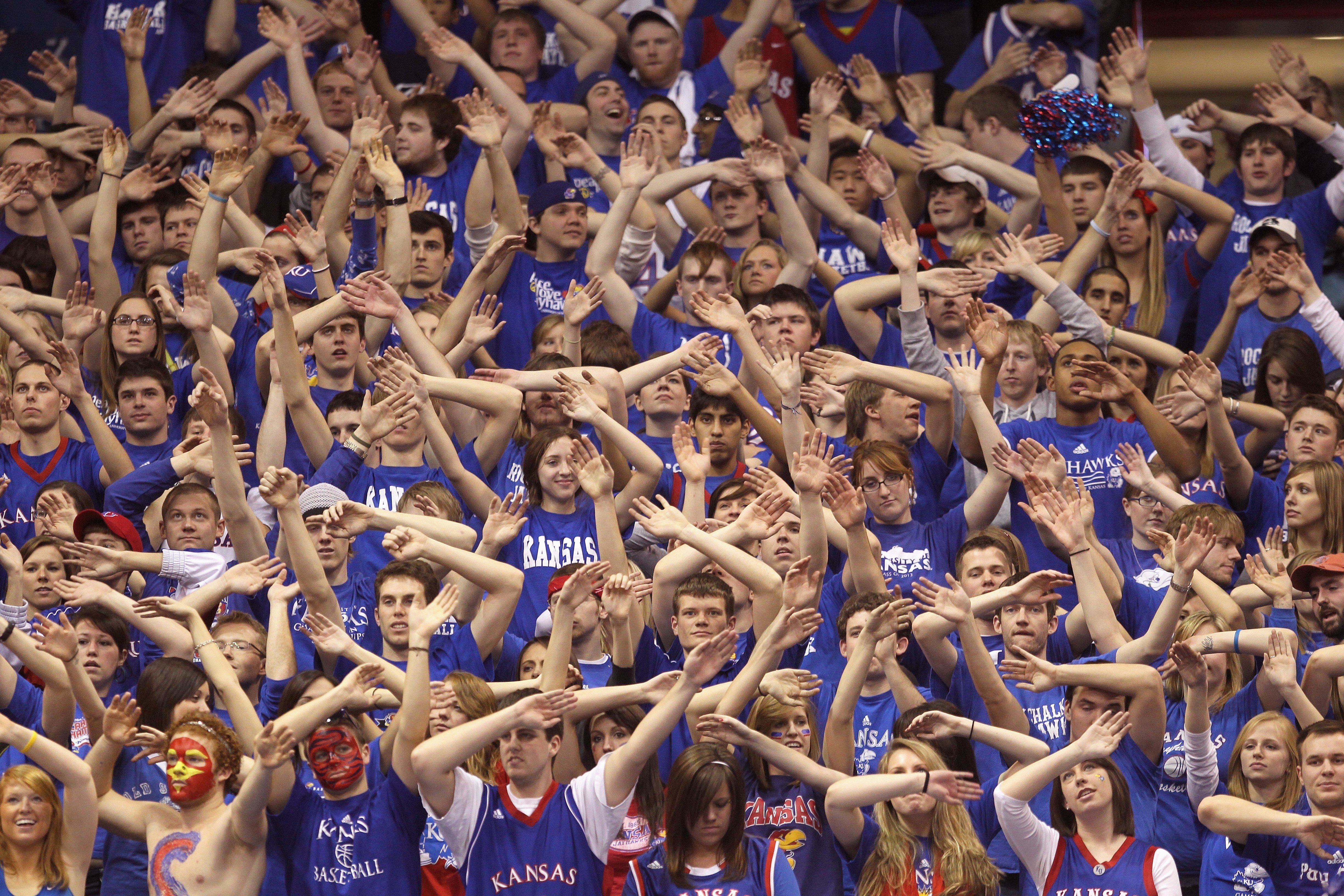 LAWRENCE, KS - FEBRUARY 06: Fans of the Kansas Jayhawks cheer during the game against the Nebraska Cornhuskers on February 6, 2010 at Allen Fieldhouse in Lawrence, Kansas. (Photo by Jamie Squire/Getty Images)