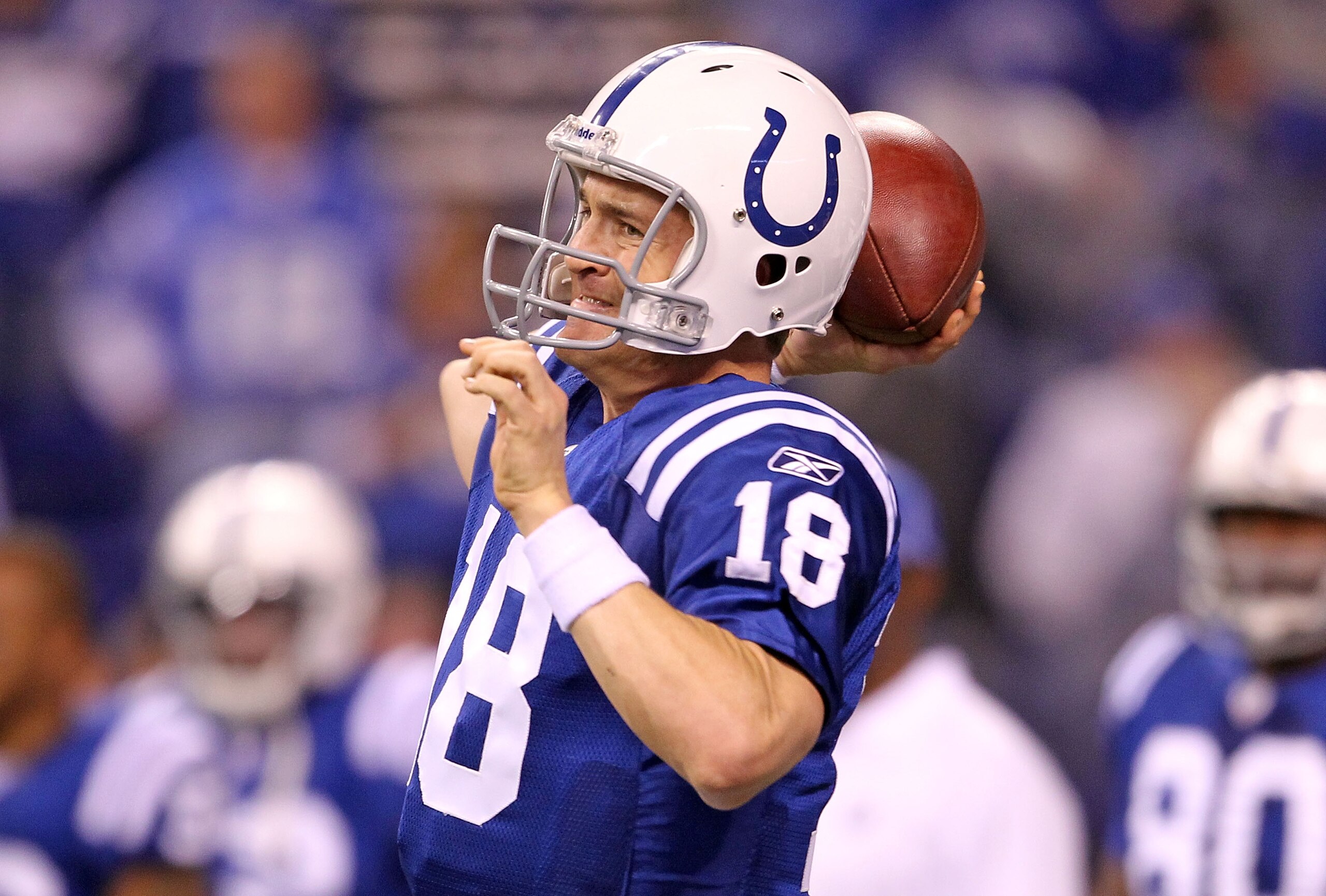 INDIANAPOLIS - NOVEMBER 28:  Peyton Manning #18 of the Indianapolis Colts throws a pass before the NFL game against the San Diego Chargers at Lucas Oil Stadium on November 28, 2010 in Indianapolis, Indiana.  (Photo by Andy Lyons/Getty Images)