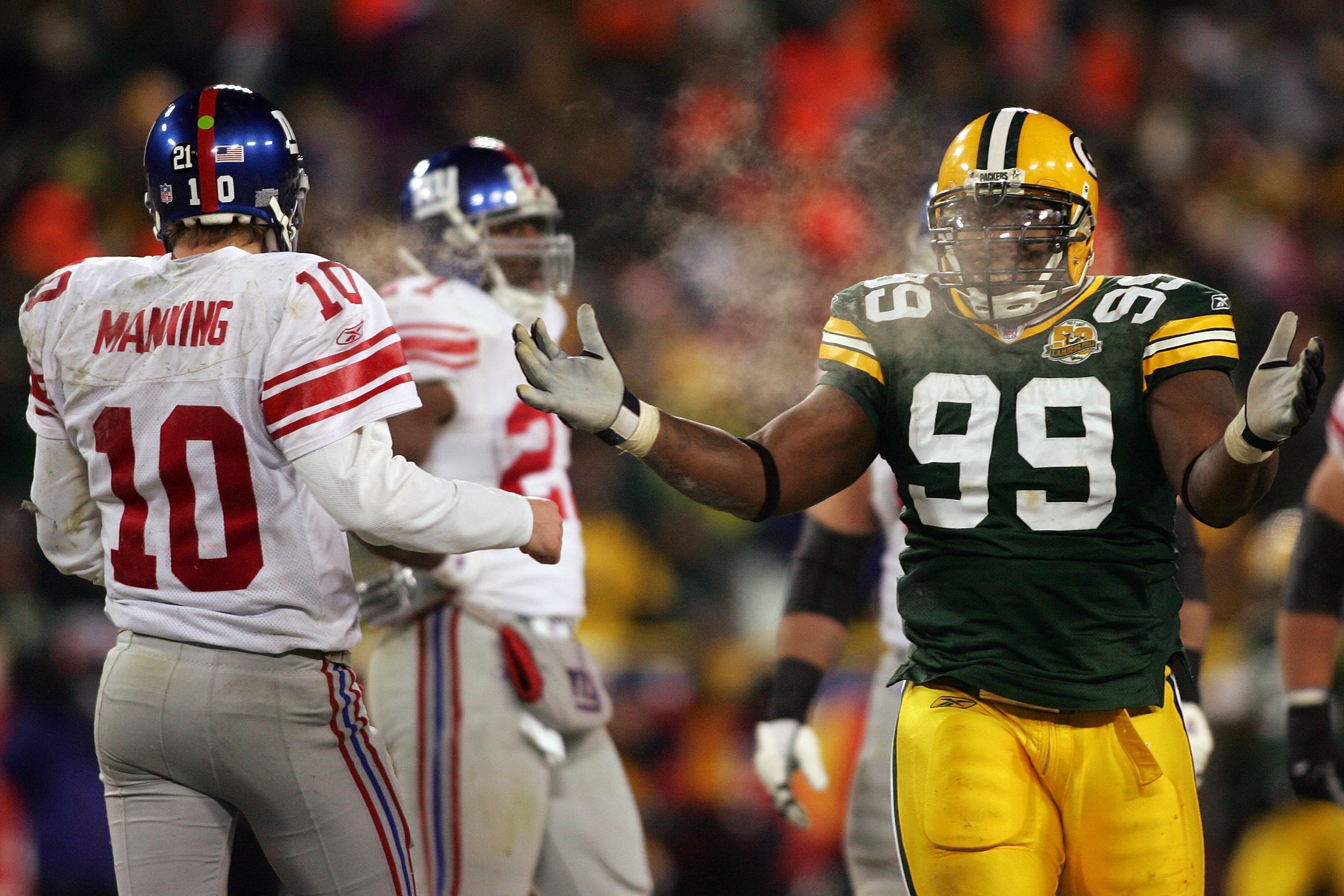 GREEN BAY, WI - JANUARY 20: Corey Williams #99 of the Green Bay Packers reacts during the NFC championship game against the New York Giants on January 20, 2008 at Lambeau Field in Green Bay, Wisconsin. The Giants defeated the Packers 23-20 in overtime to GREEN BAY, WI - JANUARY 20: Corey Williams #99 of the Green Bay Packers reacts during the NFC championship game against the New York Giants on January 20, 2008 at Lambeau Field in Green Bay, Wisconsin. The Giants defeated the Packers 23-20 in overtime to