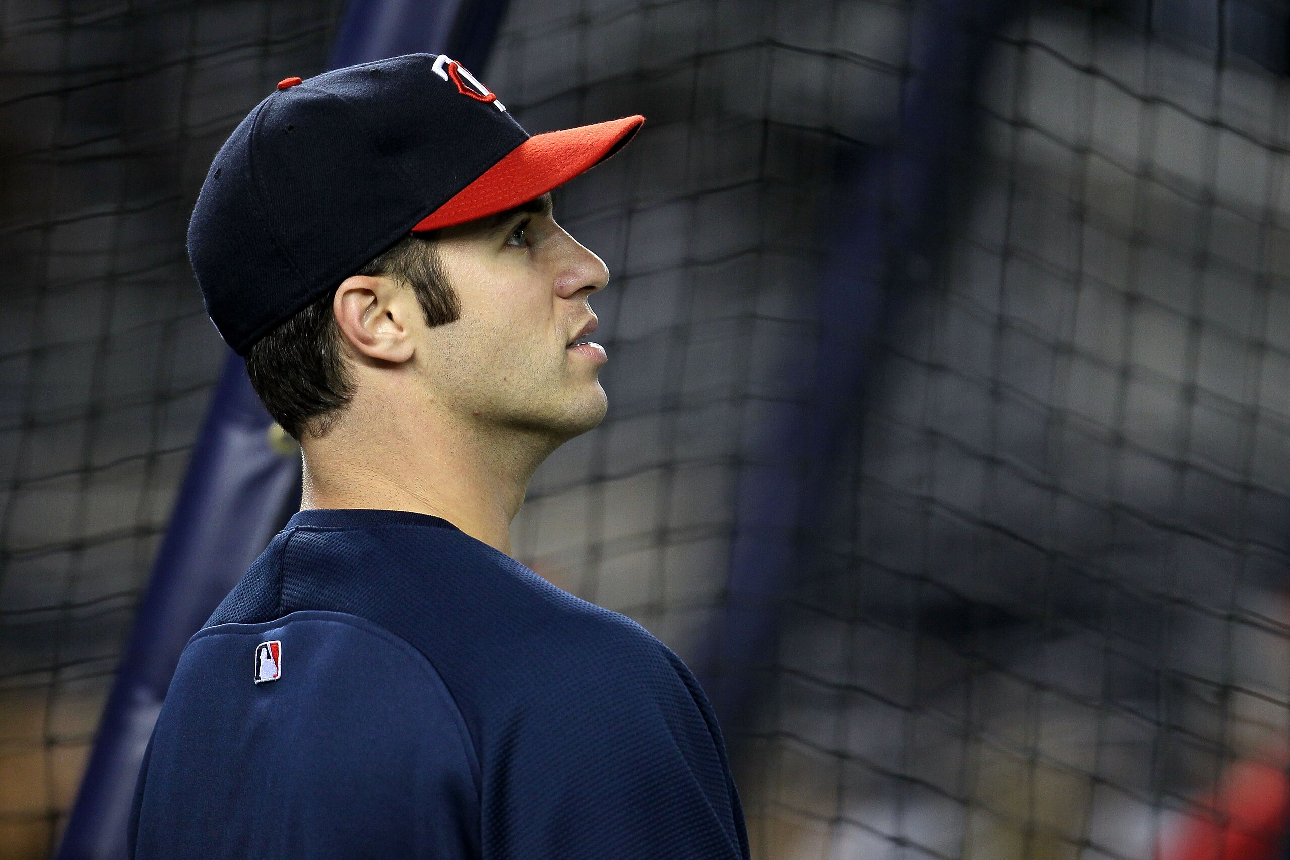 NEW YORK - OCTOBER 09:  Joe Mauer #7 of the Minnesota Twins looks on during batting practice against the New York Yankees during Game Three of the ALDS part of the 2010 MLB Playoffs at Yankee Stadium on October 9, 2010 in the Bronx borough of New York Cit