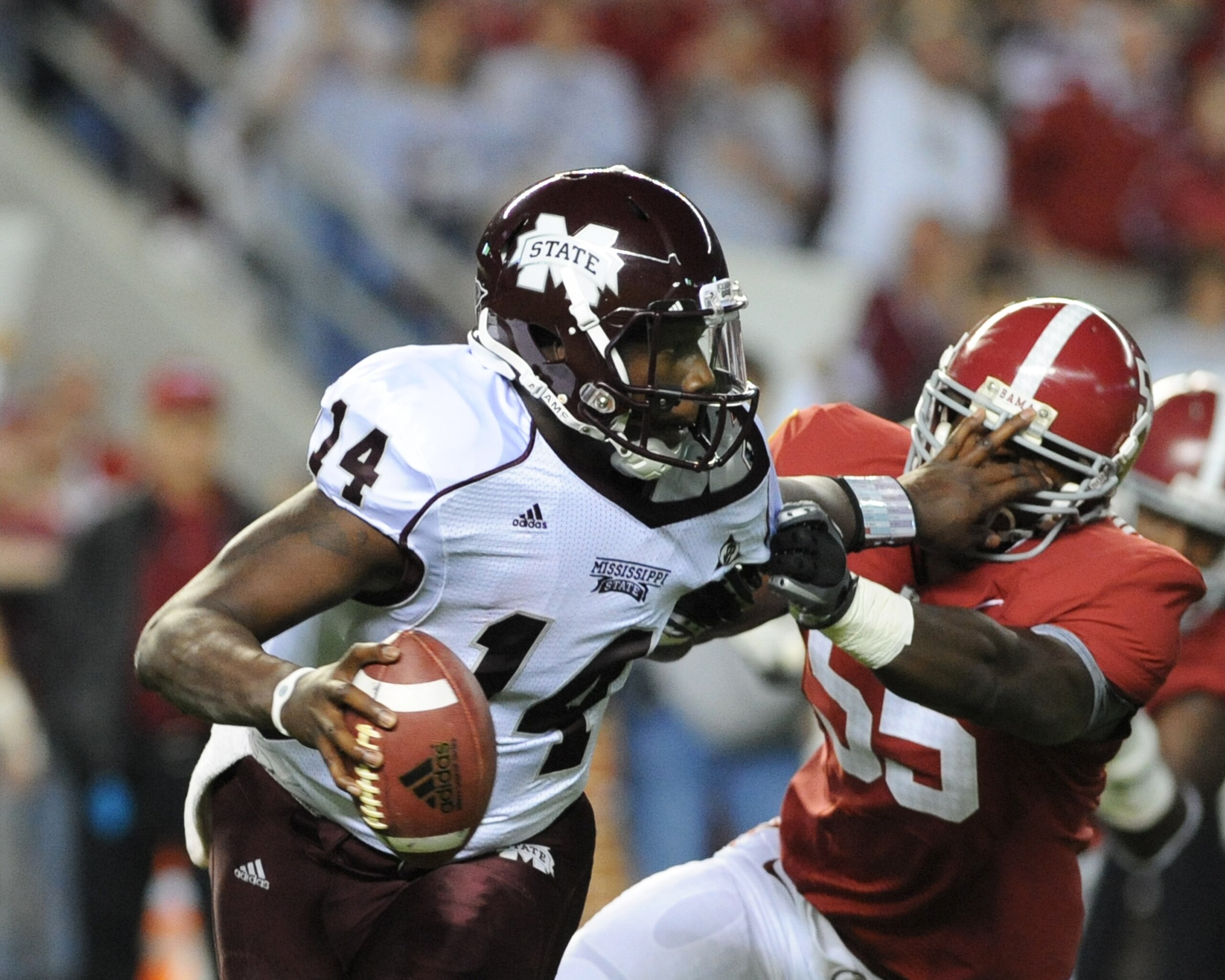 TUSCALOOSA, AL - NOVEMBER 13: Quarterback Chris Reif #14 of the Mississippi State Bulldogs rushes upfield against the Alabama Crimson Tide November 13, 2010 at Bryant-Denny Stadium in Tuscaloosa, Alabama. (Photo by Al Messerschmidt/Getty Images) TUSCALOOSA, AL - NOVEMBER 13: Quarterback Chris Reif #14 of the Mississippi State Bulldogs rushes upfield against the Alabama Crimson Tide November 13, 2010 at Bryant-Denny Stadium in Tuscaloosa, Alabama. (Photo by Al Messerschmidt/Getty Images)