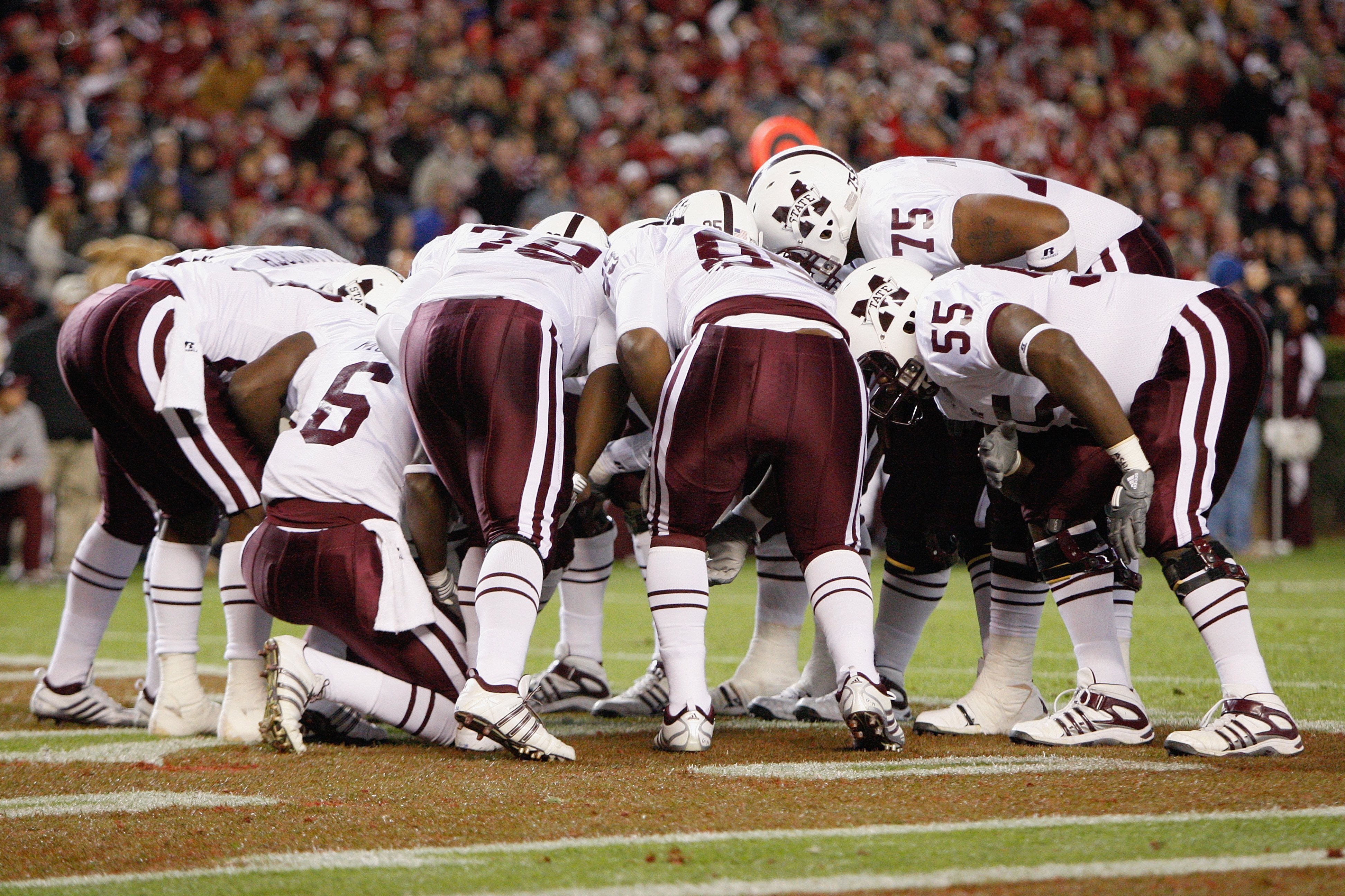 TUSCALOOSA, AL - NOVEMBER 15:  The Mississippi State Bulldogs huddle on the field during the game against the Alabama Crimson Tide at Bryant-Denny Stadium on November 15, 2008 in Tuscaloosa, Alabama.  (Photo by Kevin C. Cox/Getty Images)