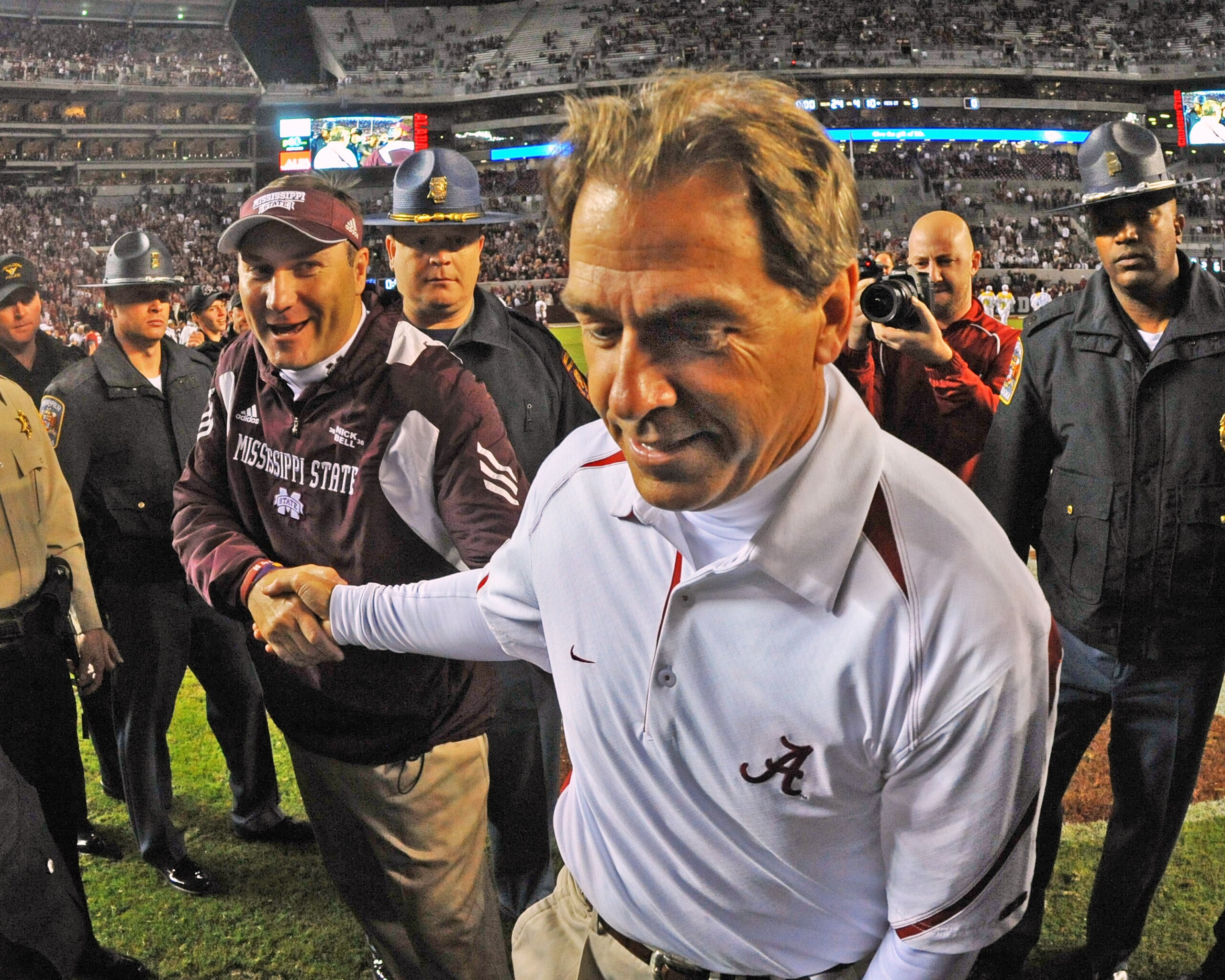 TUSCALOOSA, AL - NOVEMBER 13: Coach Dan Mullen of the Mississippi State Bulldogs shakes hands with coach Nick Saban of the Alabama Crimson Tide November 13, 2010 at Bryant-Denny Stadium in Tuscaloosa, Alabama. (Photo by Al Messerschmidt/Getty Images) TUSCALOOSA, AL - NOVEMBER 13: Coach Dan Mullen of the Mississippi State Bulldogs shakes hands with coach Nick Saban of the Alabama Crimson Tide November 13, 2010 at Bryant-Denny Stadium in Tuscaloosa, Alabama. (Photo by Al Messerschmidt/Getty Images)