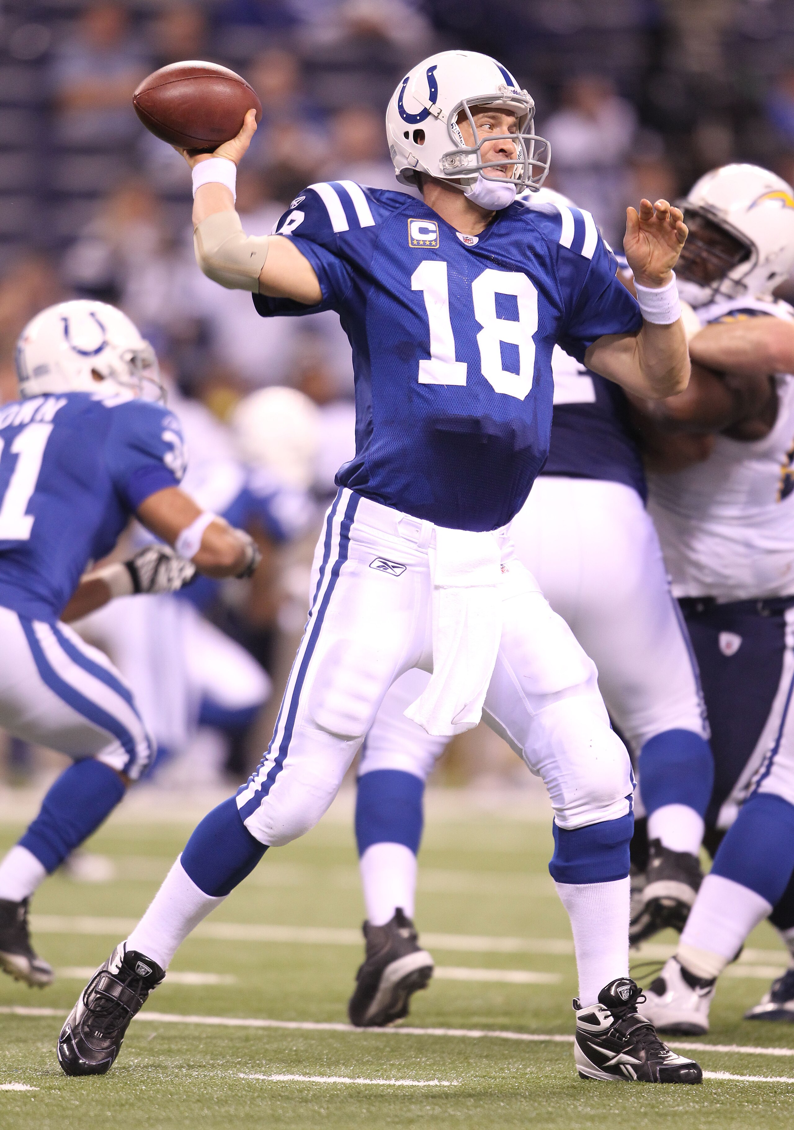 INDIANAPOLIS - NOVEMBER 28:  Peyton Manning #18 of the Indianapolis Colts throws a pass during the NFL game against the San Diego Chargers at Lucas Oil Stadium on November 28, 2010 in Indianapolis, Indiana.  The Chargers won 36-14.(Photo by Andy Lyons/Get