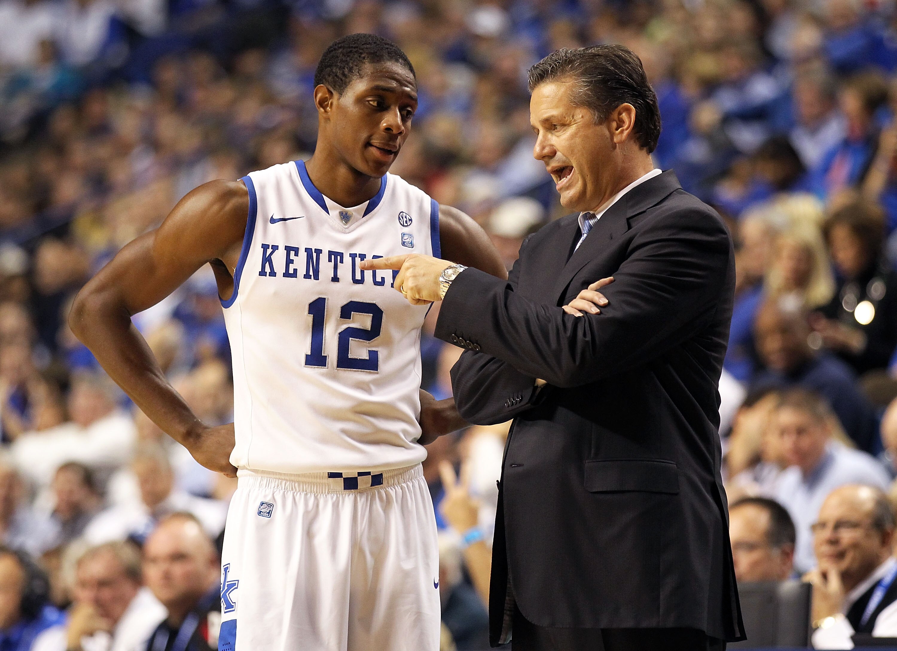 LEXINGTON, KY - NOVEMBER 30:  Brandon Knight #12 of the Kentucky Wildcats talks with Head Coach John Calipari during the game against the Boston University Terriers on November 30, 2010 in Lexington, Kentucky.  (Photo by Andy Lyons/Getty Images)