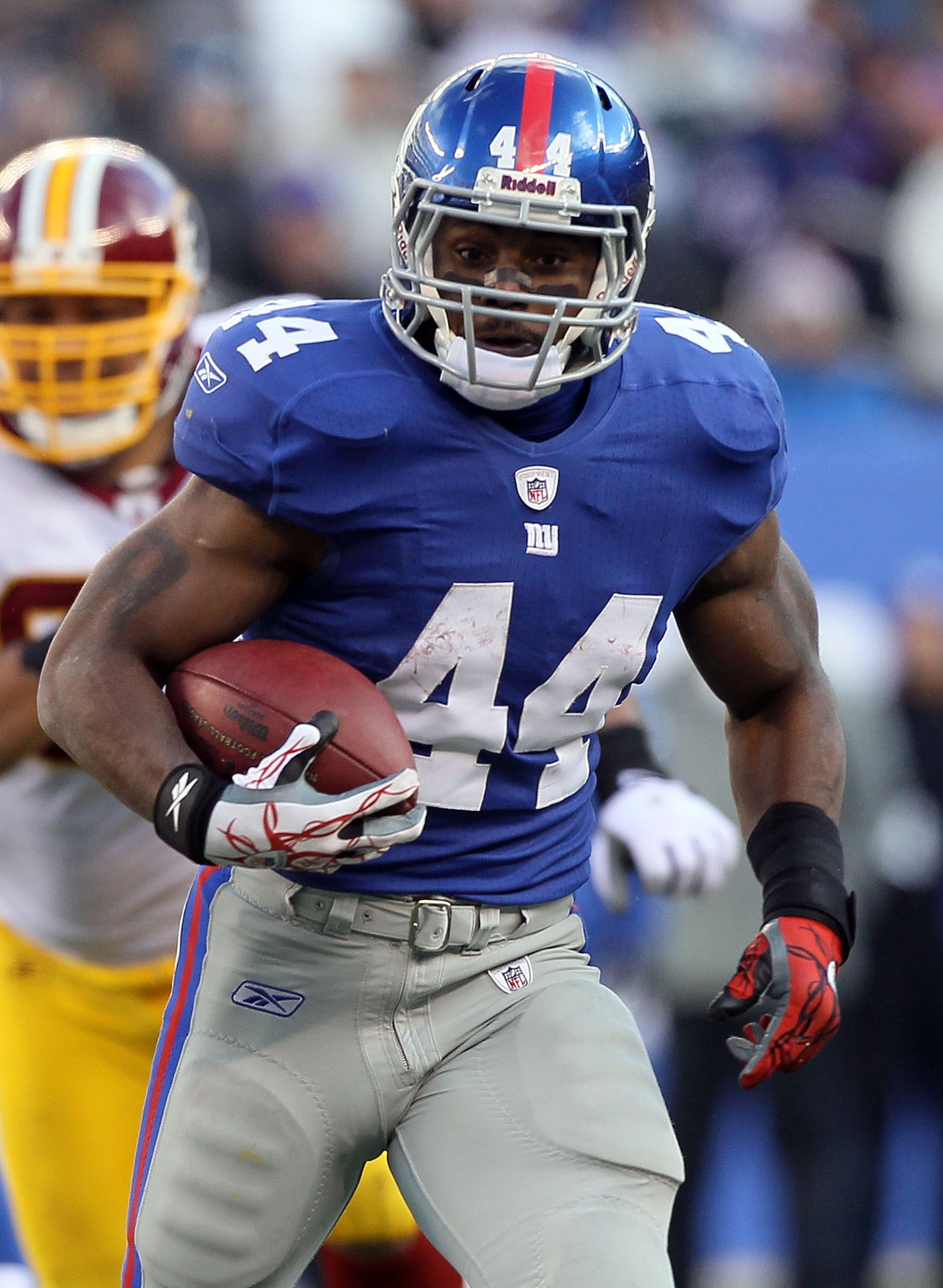 EAST RUTHERFORD, NJ - DECEMBER 05: Ahmad Bradshaw #44 of the New York Giants runs the ball against the Washington Redskins on December 5, 2010 at the New Meadowlands Stadium in East Rutherford, New Jersey. The Giants defeated the Redskins 31-7. (Photo b EAST RUTHERFORD, NJ - DECEMBER 05: Ahmad Bradshaw #44 of the New York Giants runs the ball against the Washington Redskins on December 5, 2010 at the New Meadowlands Stadium in East Rutherford, New Jersey. The Giants defeated the Redskins 31-7. (Photo b