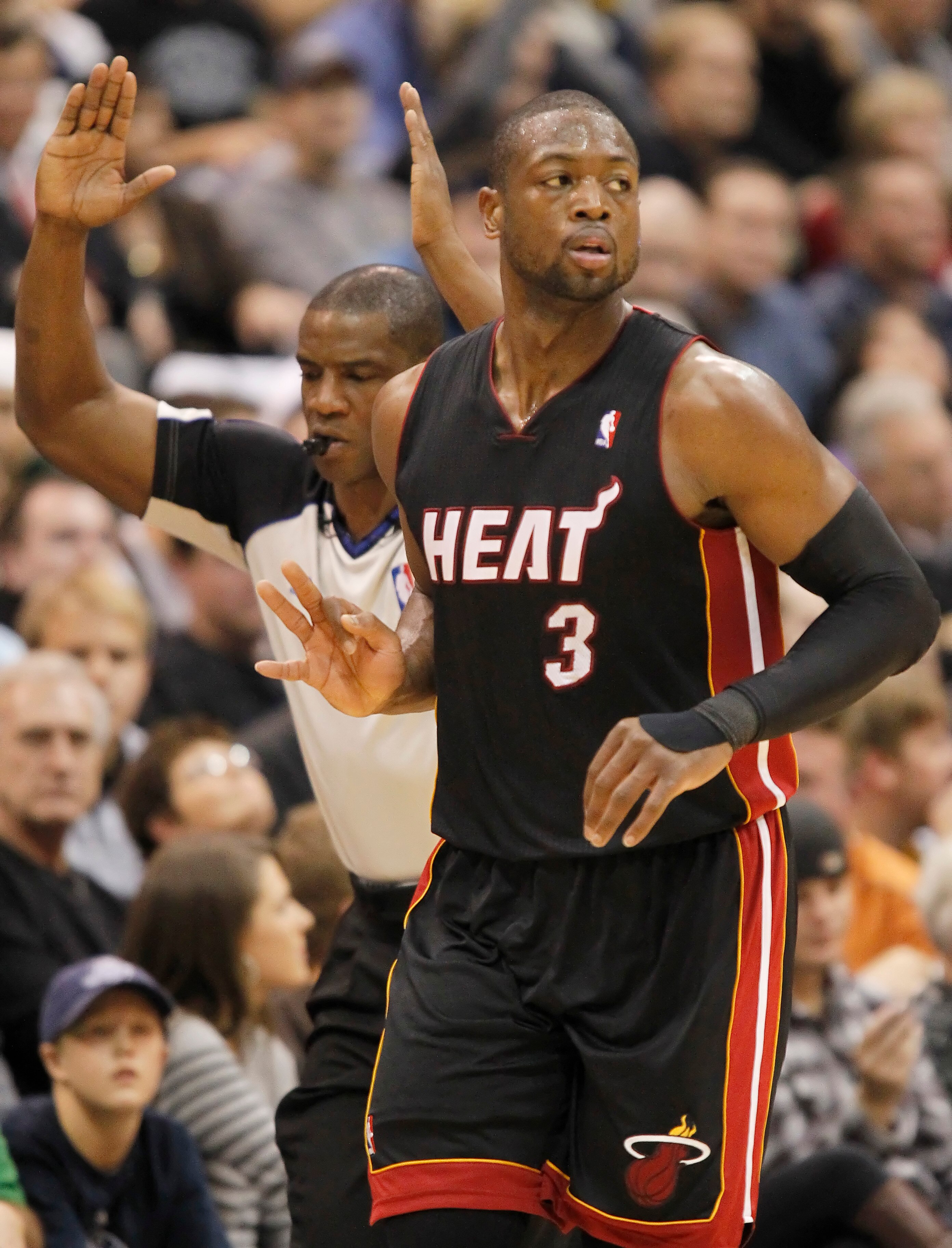 SALT LAKE CITY, UT - DECEMBER 8: Dwyane Wade #3 of the Miami Heat gestures a three after making a three point shot in a game against the Utah Jazz during the second half of an NBA game December 8, 2010 at Energy Solutions Arena in Salt Lake City, Utah. Th