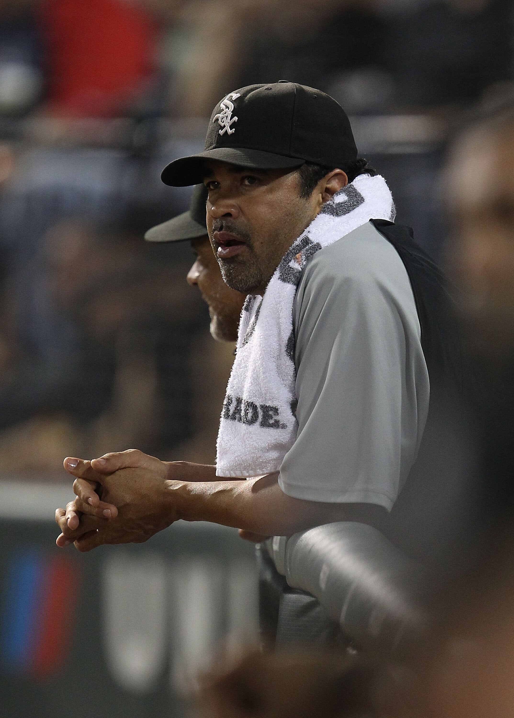 CHICAGO - AUGUST 10: Manager Ozzie Guillen #13 of the Chicago White Sox watches as his team takes on the Minnesota Twins at U.S. Cellular Field on August 10, 2010 in Chicago, Illinois. The Twins defeated the White Sox 12-6. (Photo by Jonathan Daniel/Getty