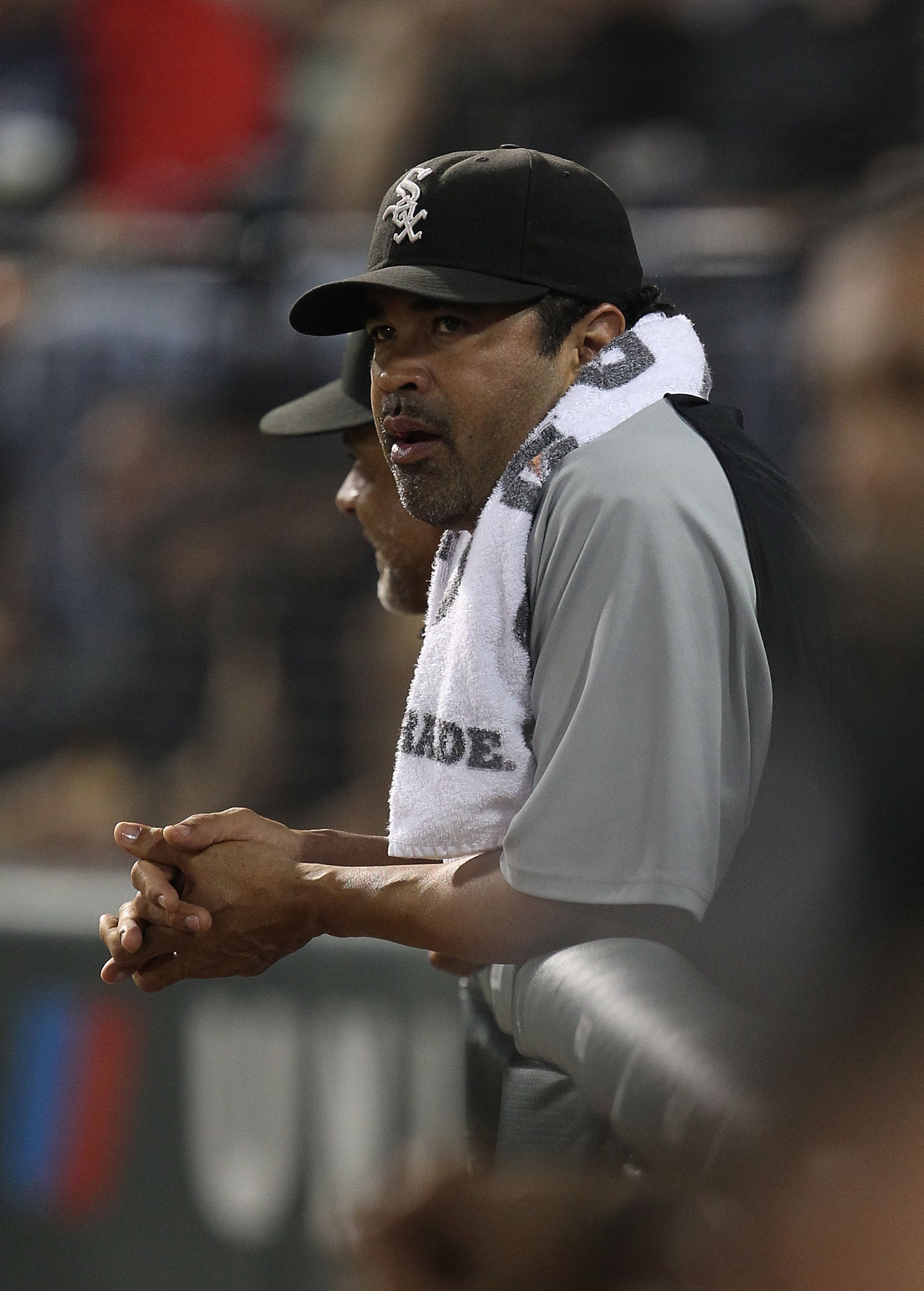CHICAGO - AUGUST 10: Manager Ozzie Guillen #13 of the Chicago White Sox watches as his team takes on the Minnesota Twins at U.S. Cellular Field on August 10, 2010 in Chicago, Illinois. The Twins defeated the White Sox 12-6. (Photo by Jonathan Daniel/Getty