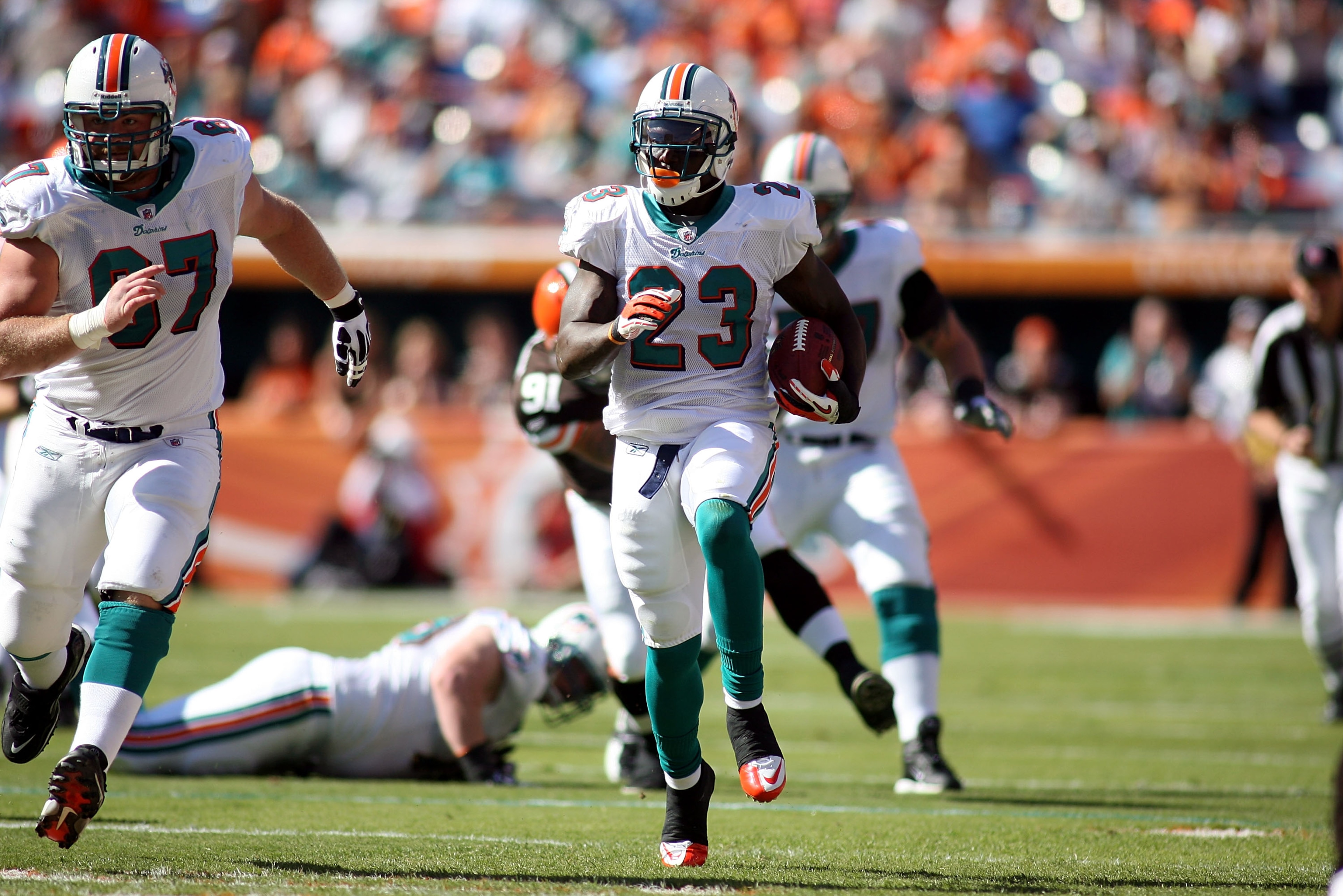 MIAMI, FL - DECEMBER 05:  Running back Ronnie Brown #23 of the miami Dolphins carries against the Cleveland Browns at Sun Life Stadium on December 5, 2010 in Miami, Florida. Cleveland defeated Miami 13-10.  (Photo by Marc Serota/Getty Images)