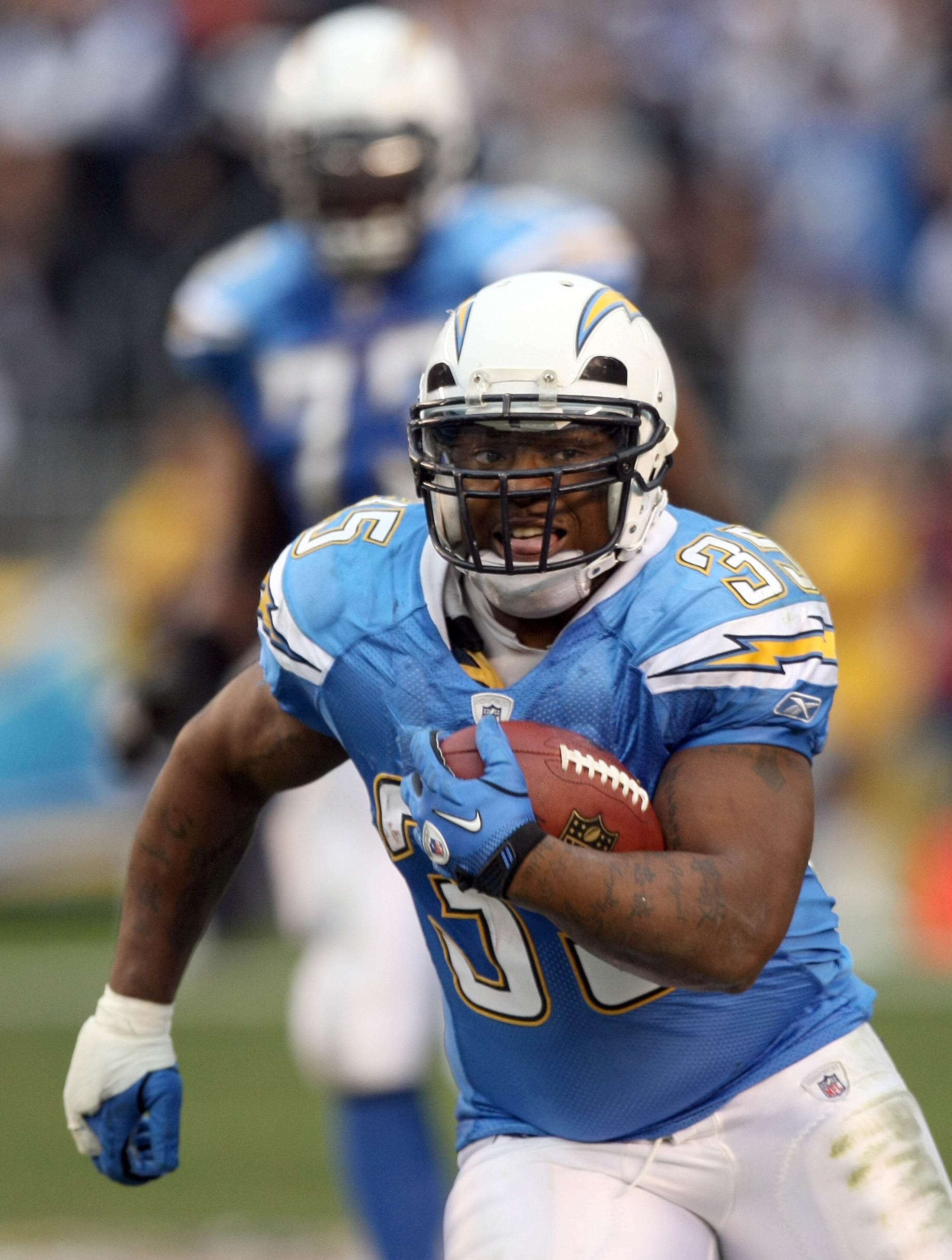 SAN DIEGO, CA - DECEMBER 5: Runningback Mike Tolbert #35 of the San Diego Chargers runs against the Oakland Raiders during their NFL game at Qualcomm Stadium on December 5, 2010 in San Diego, California. (Photo by Donald Miralle/Getty Images)