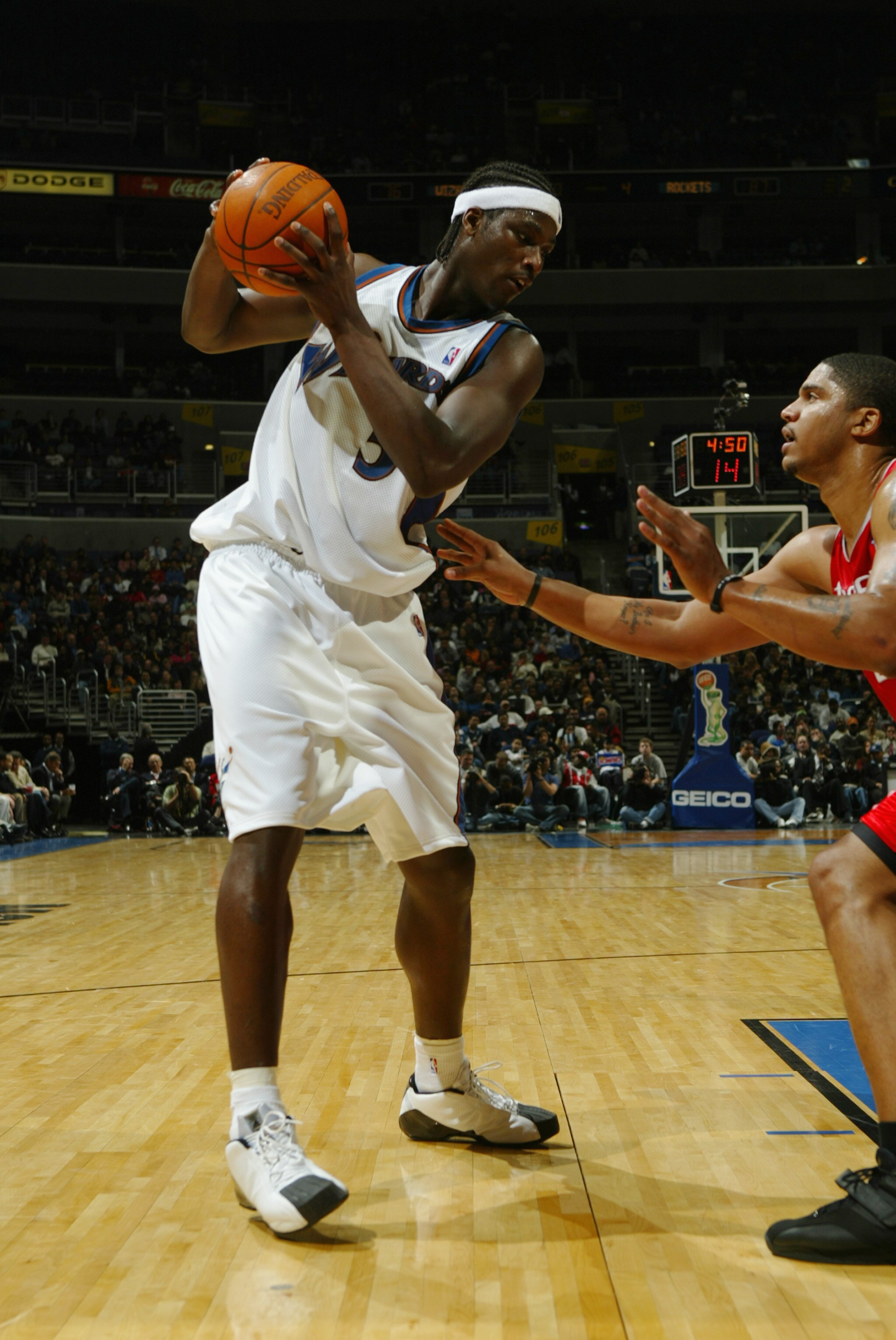 WASHINGTON - JANUARY 13:  Kwame Brown #5 of the Washington Wizards is defended by Maurice Taylor #2 of the Houston Rockets during the game at MCI Center on January 13, 2004 in Washington, DC.  The Rockets won 93-80.  NOTE TO USER: User expressly acknowled