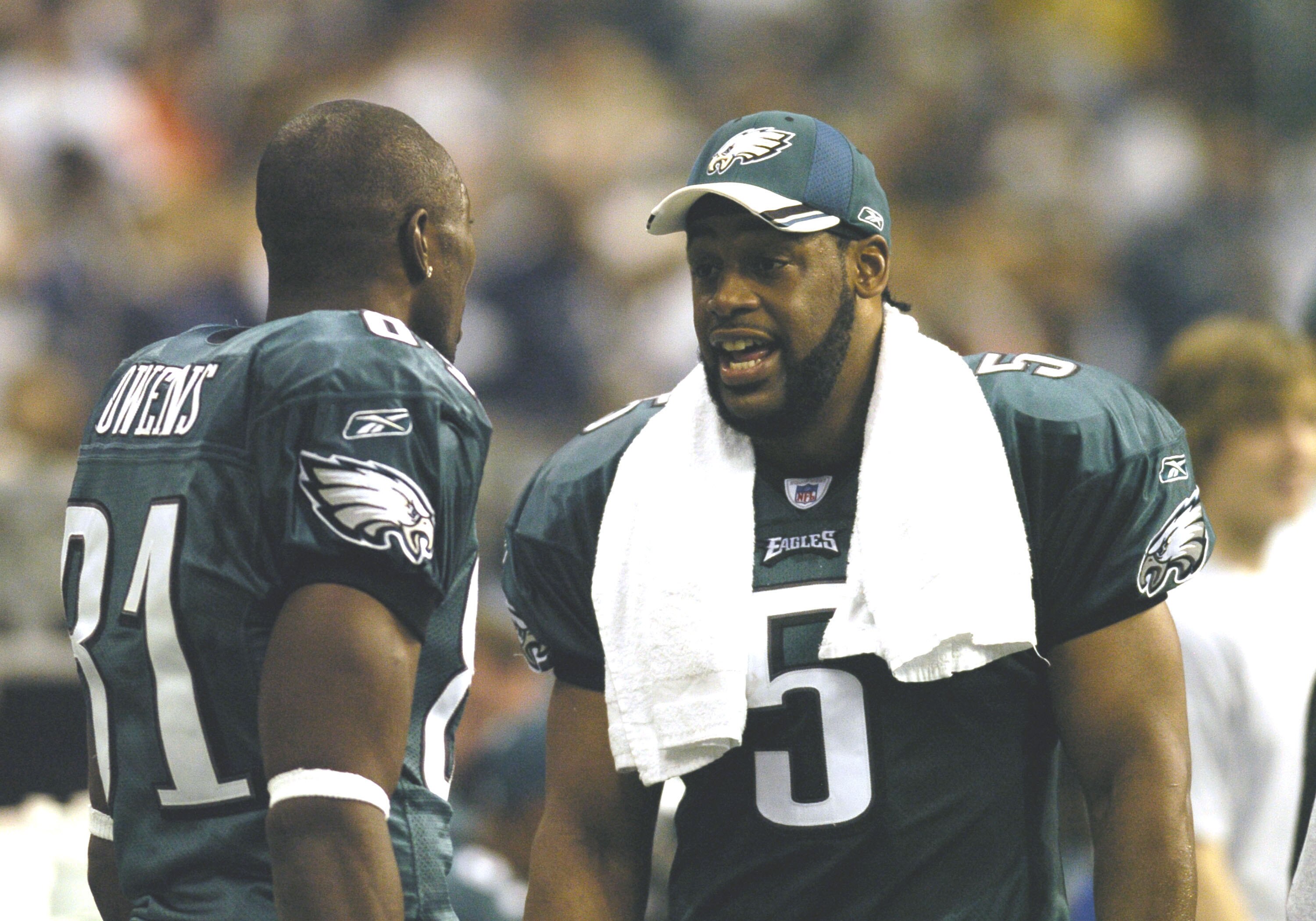 Philadephia Eagles Donovan McNabb talks with wide receiver Terrell Owens after a 59-yard McNabb to Owens touchdown pass    against the Dallas Cowboys on Monday Night Football November 15, 2005 at Texas Stadium.  (Photo by Al Messerschmidt/Getty Images)