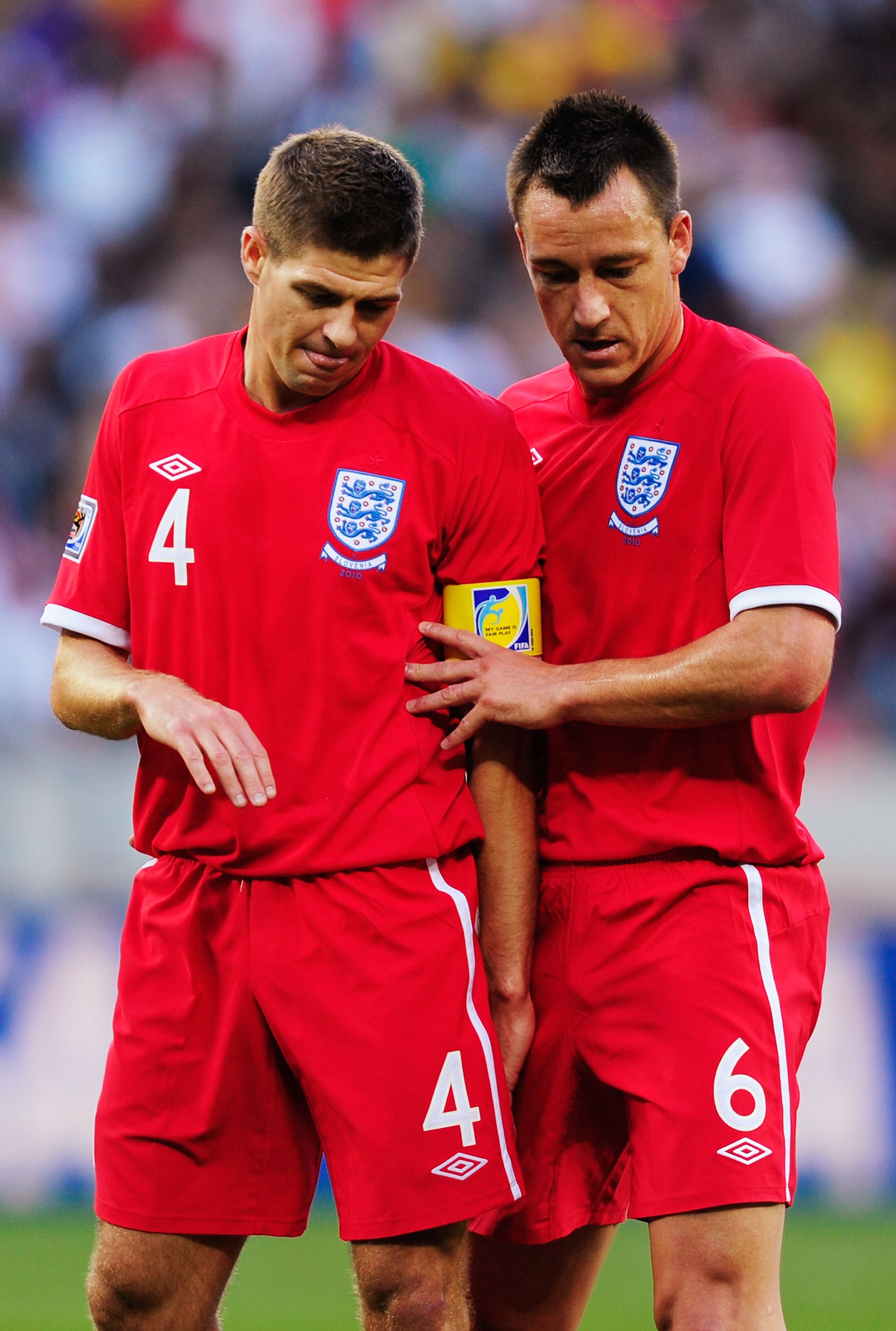 PORT ELIZABETH, SOUTH AFRICA - JUNE 23: Captain Steven Gerrard and John Terry of England look on during the 2010 FIFA World Cup South Africa Group C match between Slovenia and England at the Nelson Mandela Bay Stadium on June 23, 2010 in Port Elizabeth, S