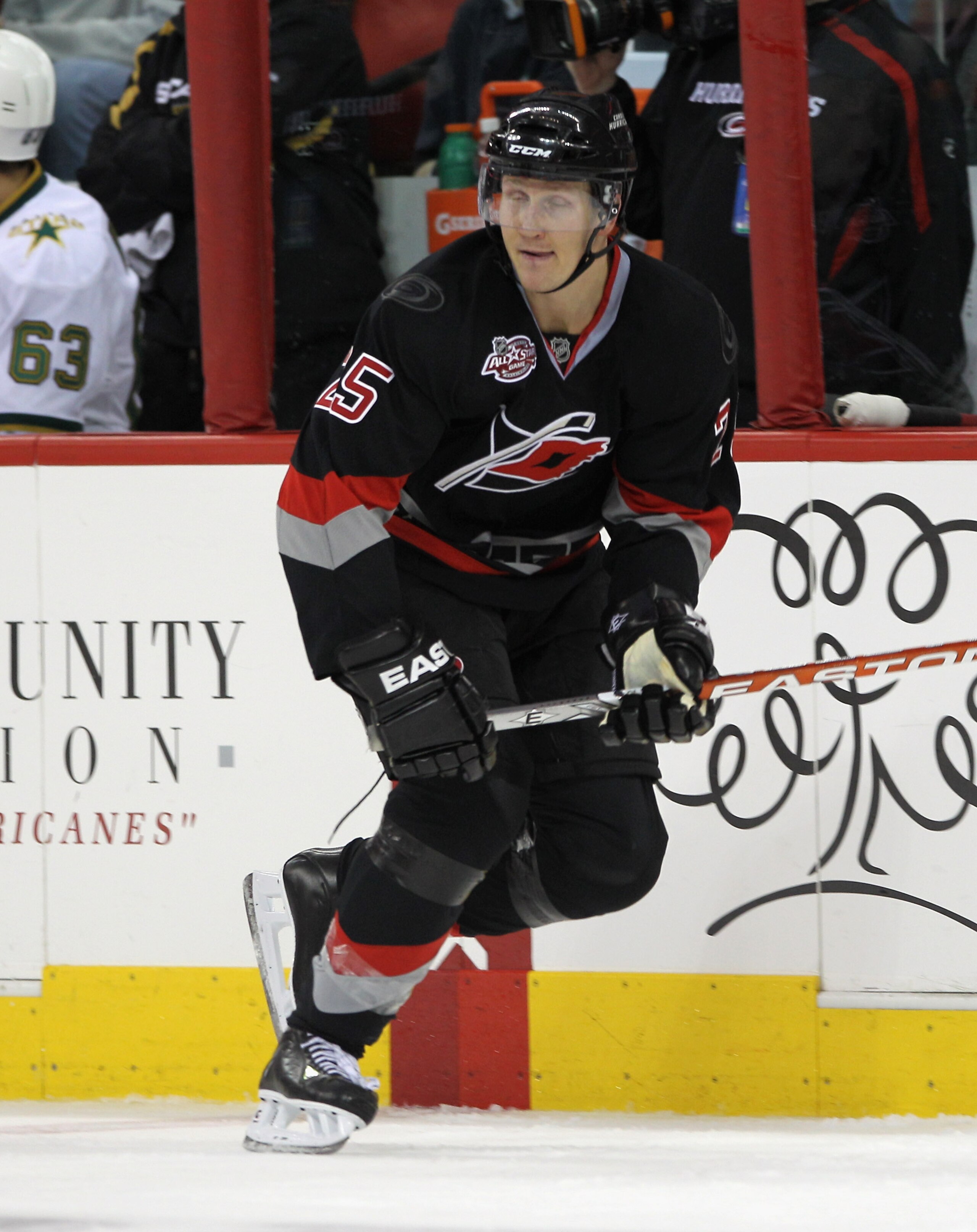 RALEIGH, NC - NOVEMBER 29:  Joni Pitkanen #25 of the Carolina Hurricanes skates against the Dallas Stars at the RBC Center on November 29, 2010 in Raleigh, North Carolina. The Stars defeated the Hurricanes 4-1.  (Photo by Bruce Bennett/Getty Images)