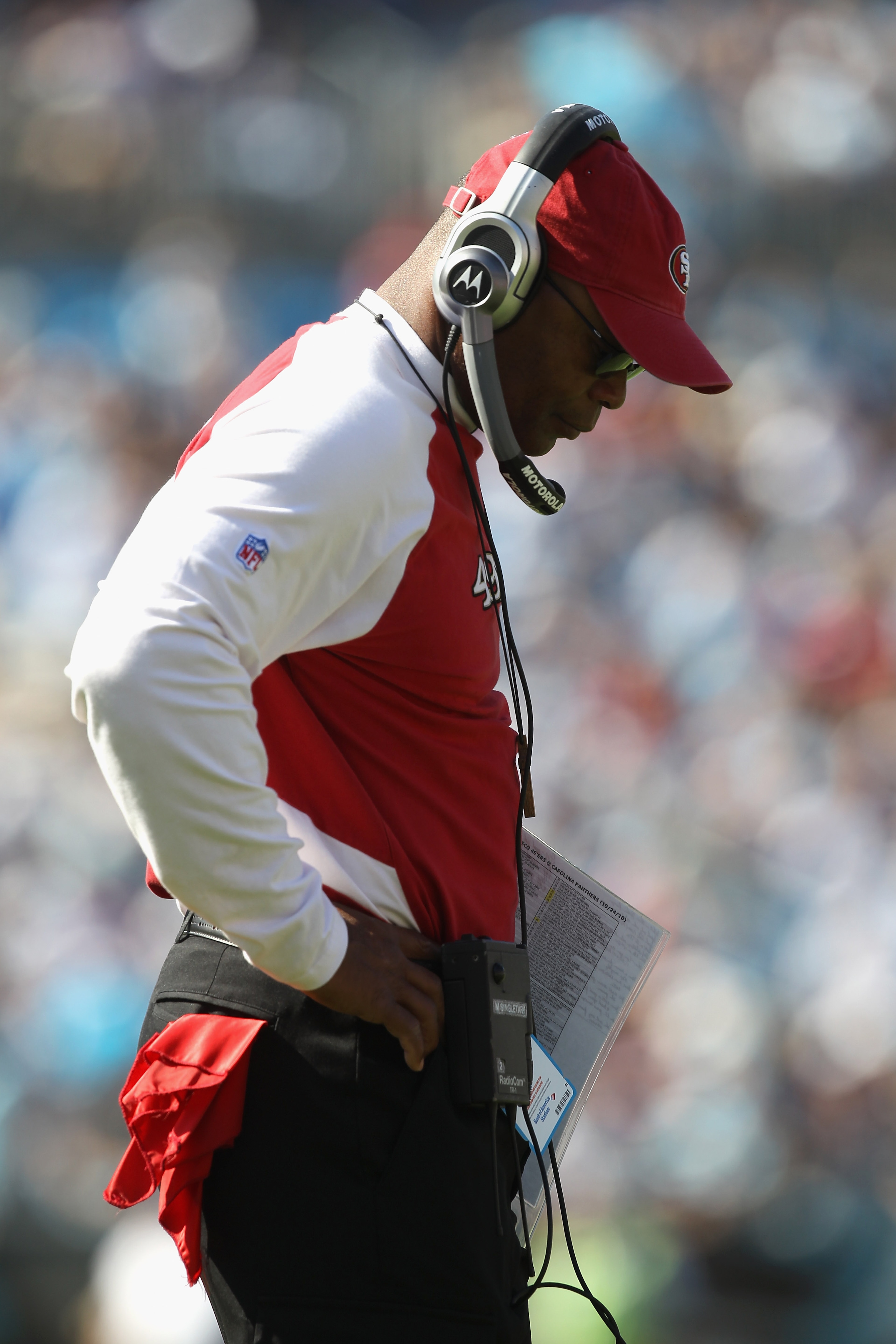 CHARLOTTE, NC - OCTOBER 24:  Head coach Mike Singletary of the San Francisco 49ers walks to the sidelines against the Carolina Panthers during their game at Bank of America Stadium on October 24, 2010 in Charlotte, North Carolina.  (Photo by Streeter Leck