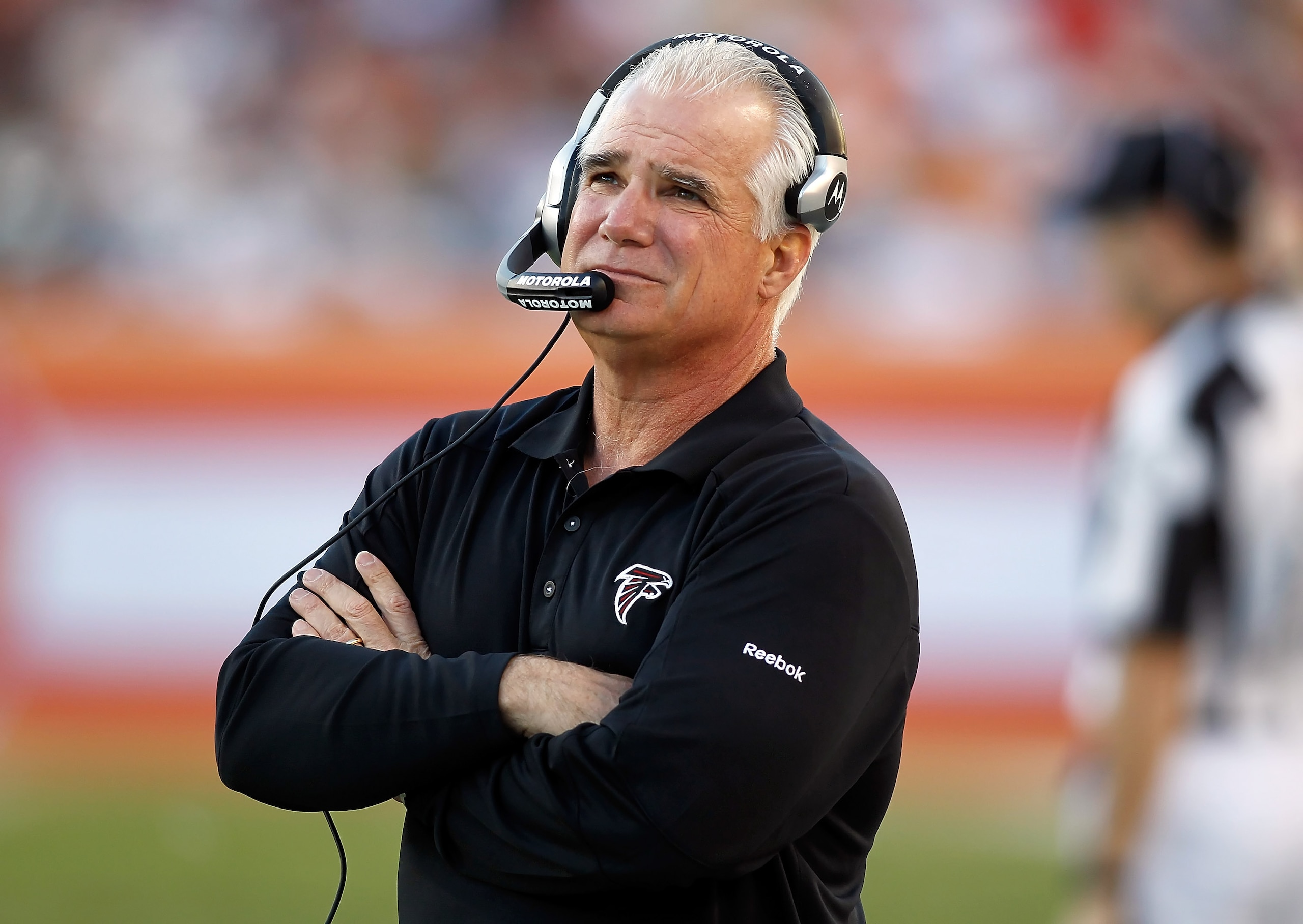 TAMPA, FL - DECEMBER 05:  Head coach Mike Smith of the Atlanta Falcons watches his team against the Tampa Bay Buccaneers during the game at Raymond James Stadium on December 5, 2010 in Tampa, Florida.  (Photo by J. Meric/Getty Images)