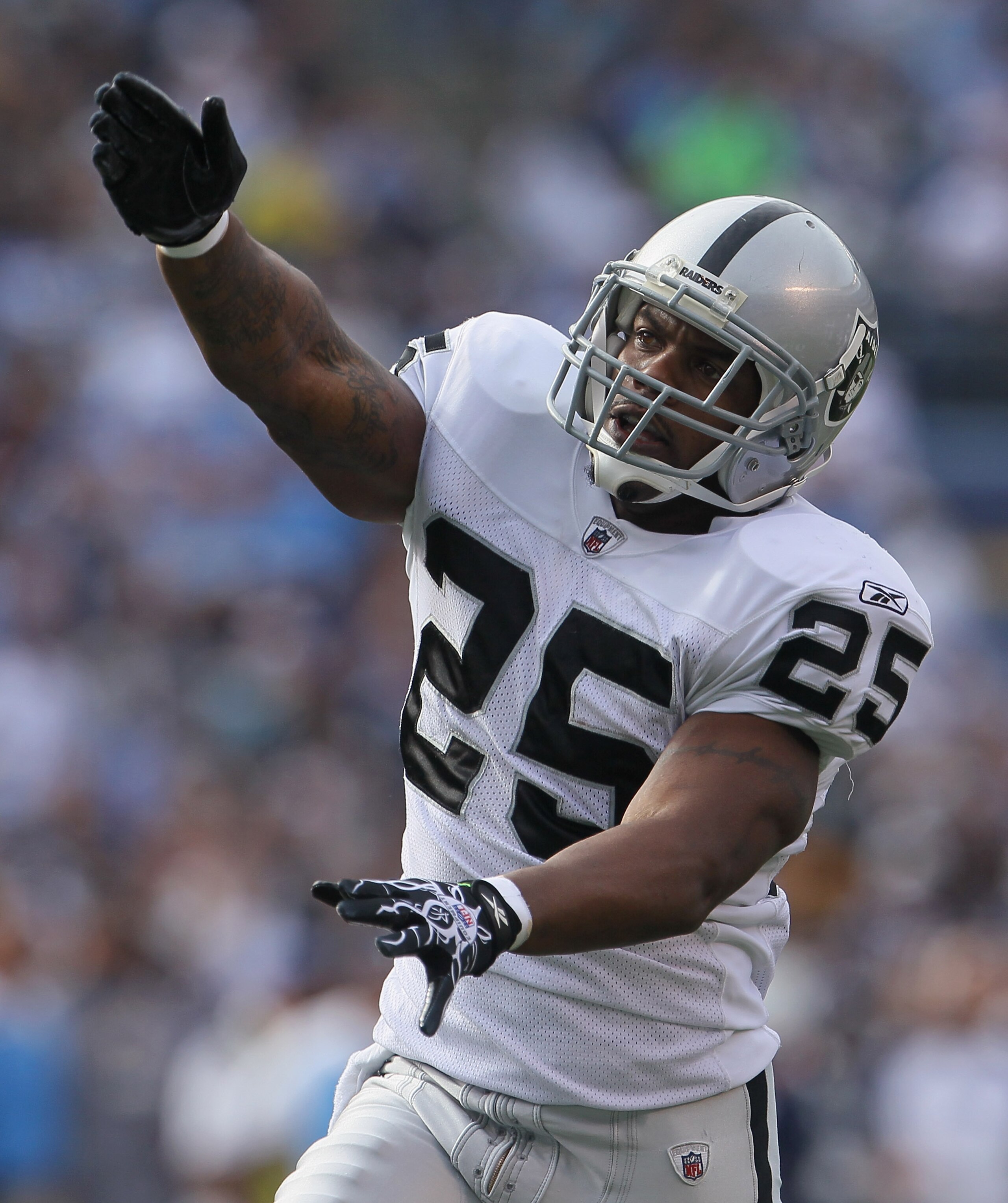 SAN DIEGO - DECEMBER 05: Rock Cartwright #25 of the Oakland Raiders celebrates after his team recovered a fumble in the first quarter against the San Diego Chargers at Qualcomm Stadium on December 5, 2010 in San Diego, California. The Raiders defeated th SAN DIEGO - DECEMBER 05: Rock Cartwright #25 of the Oakland Raiders celebrates after his team recovered a fumble in the first quarter against the San Diego Chargers at Qualcomm Stadium on December 5, 2010 in San Diego, California. The Raiders defeated th