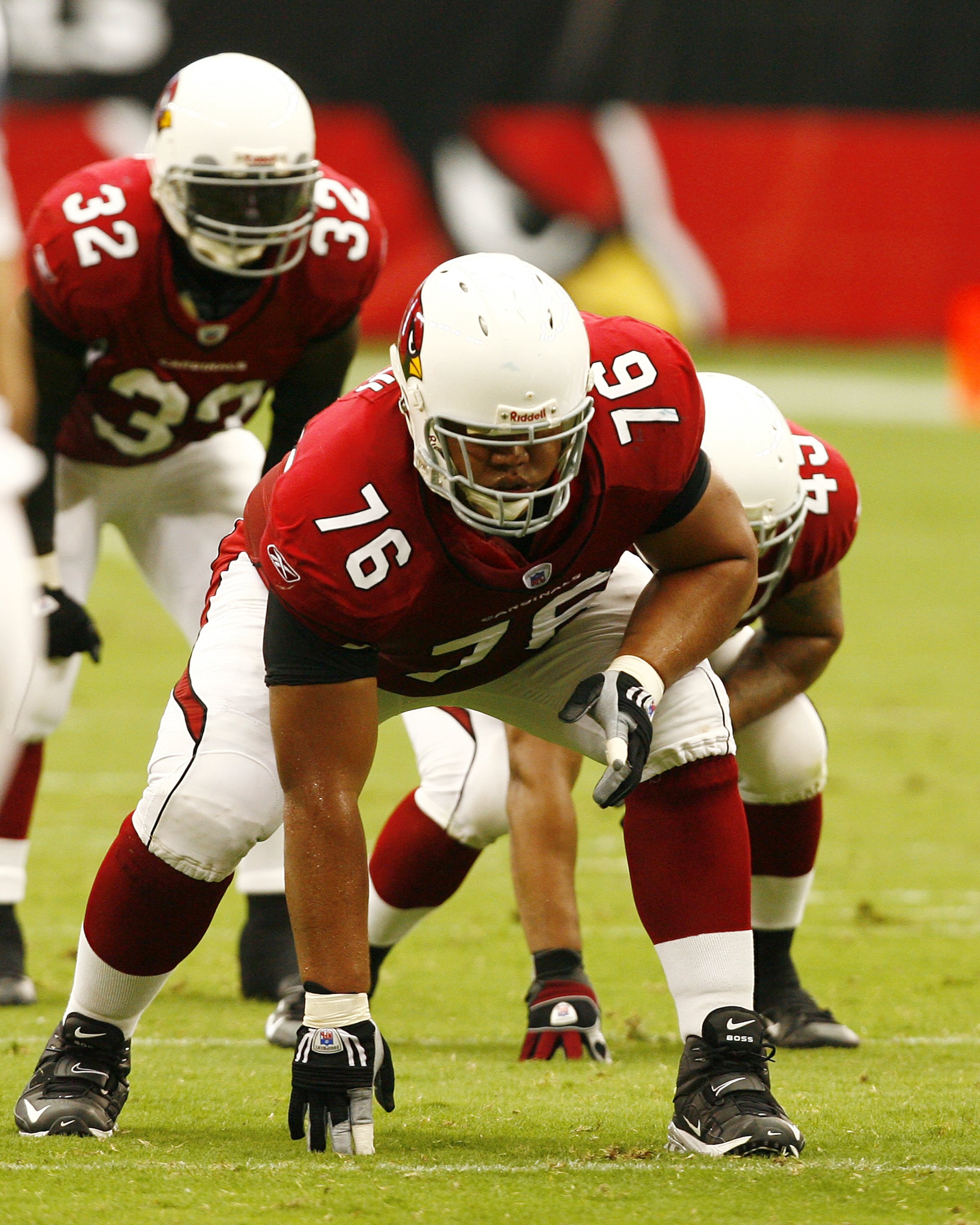 GLENDALE, AZ - SEPTEMBER 16:  Guard Deuce Lutui of the Arizona Cardinals #63 in a three-point stance against the Seattle Seahawks at University of Phoenix Stadium on September 16, 2007 in Glendale, Arizona.  The Cardinals defeated the Seahawks 23-20. (Pho