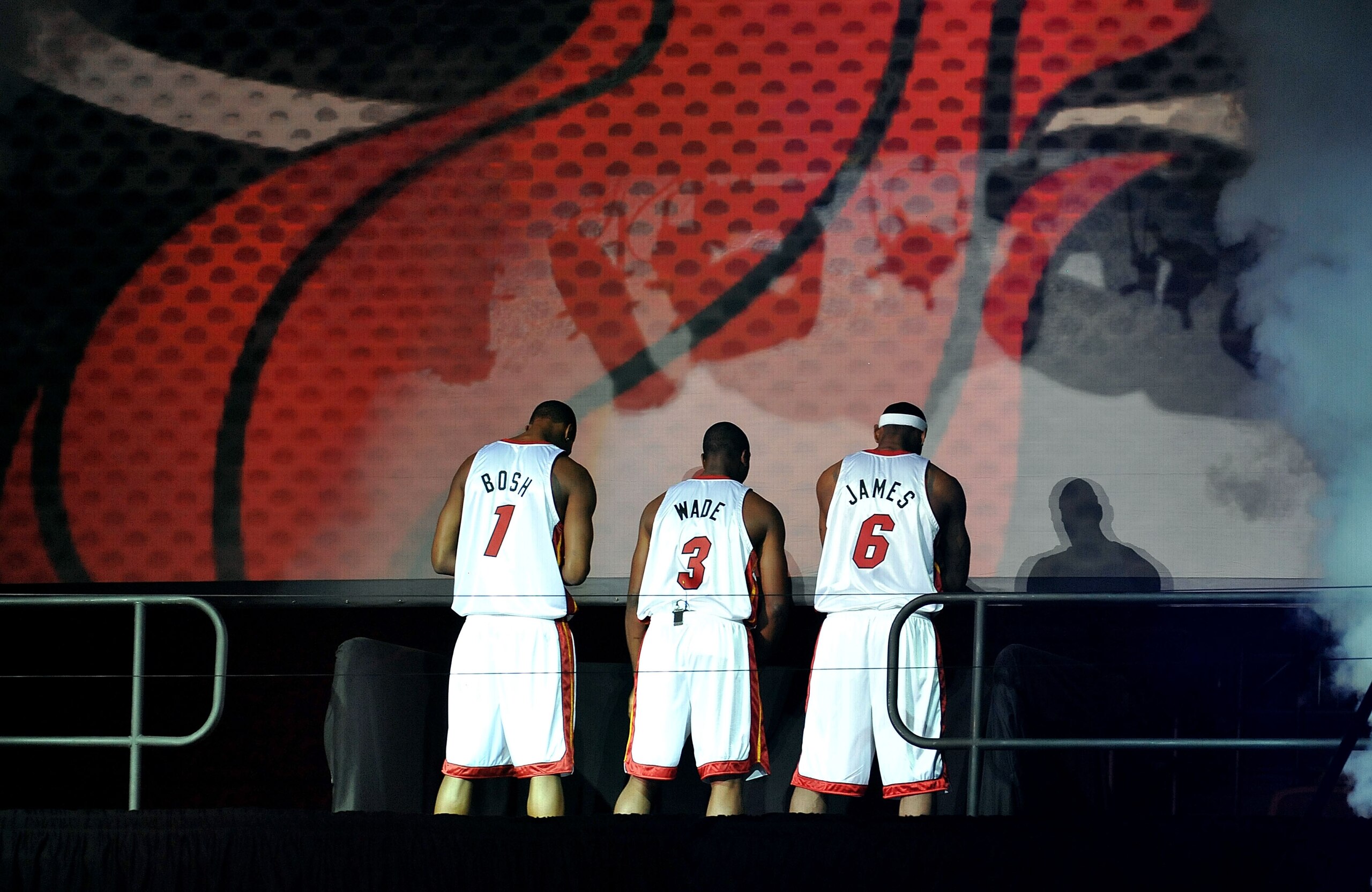 MIAMI - JULY 09:  Chris Bosh #1, Dwyane Wade #3, and LeBron James #6 of the Miami Heat are introduced to fans during a welcome party at American Airlines Arena on July 9, 2010 in Miami, Florida.  (Photo by Doug Benc/Getty Images)
