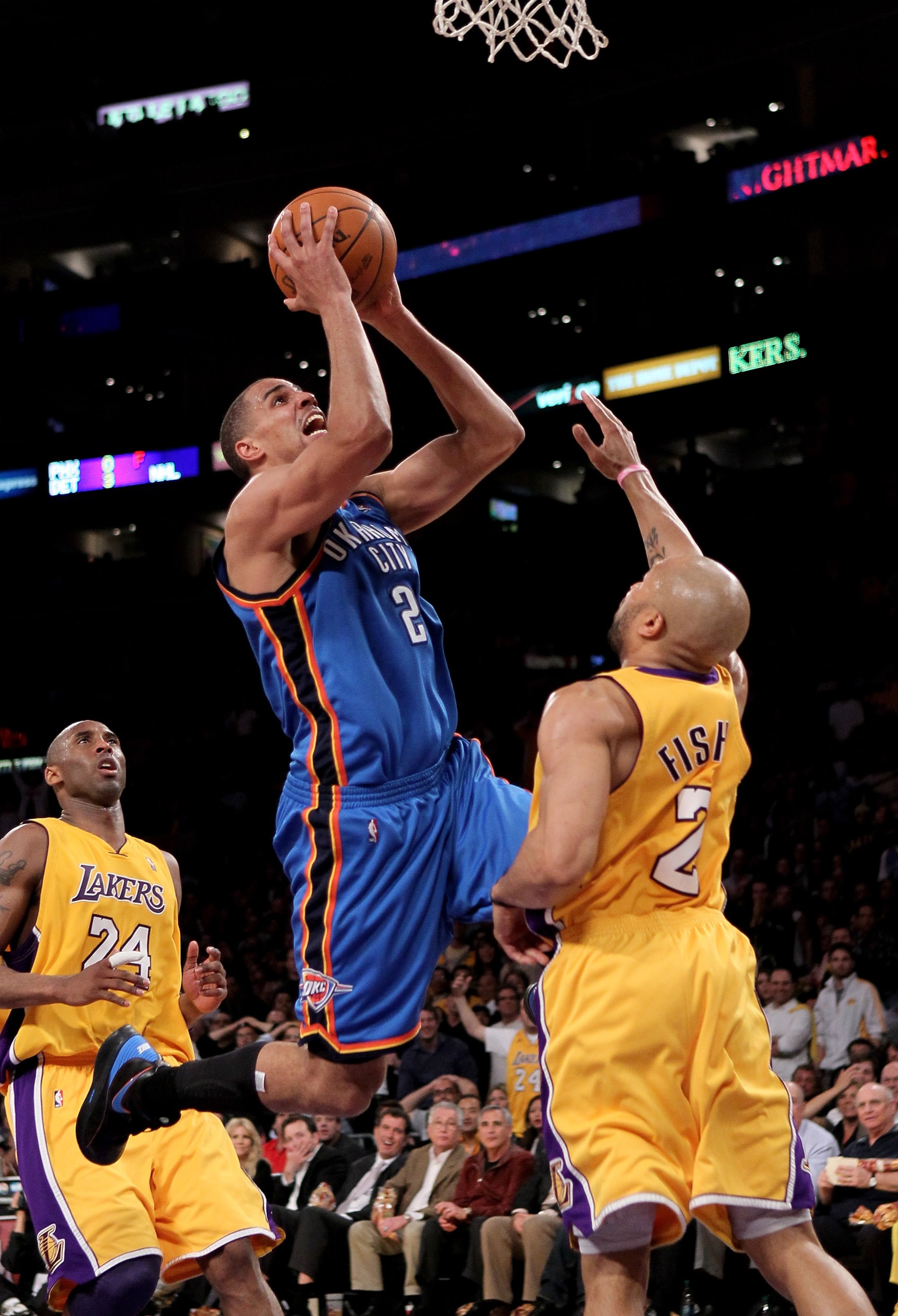 LOS ANGELES - APRIL 20:  Thabo Sefolosha #2 of the Oklahoma City Thunder shoots over Derek Fisher #2 of the Los Angeles Lakers during  Game Two of the Western Conference Quarterfinals of the 2010 NBA Playoffs on April 20, 2010 at Staples Center in Los Ang