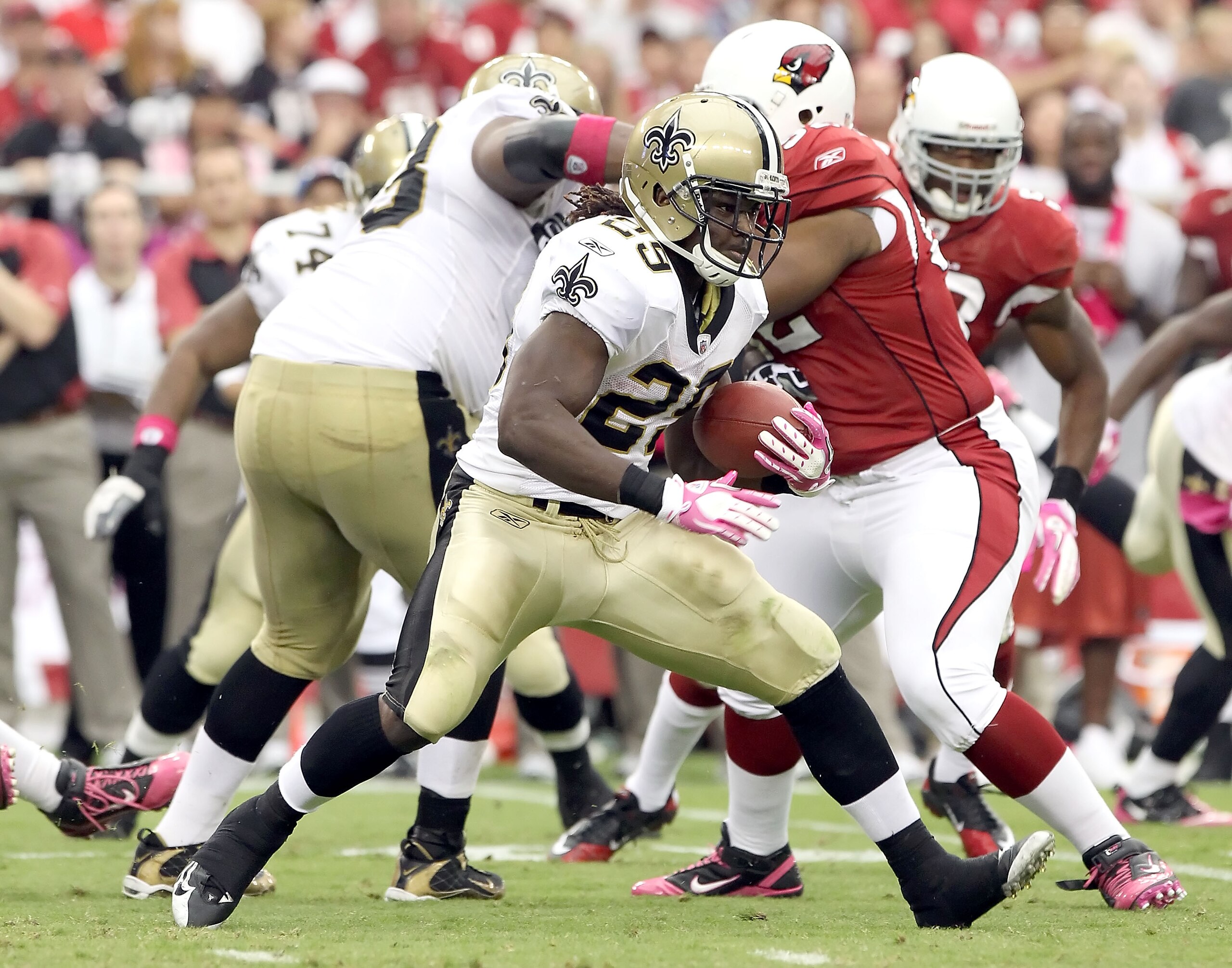 GLENDALE, AZ - OCTOBER 10: Runningback Chris Ivory #29 of the New Orleans Saints runs with the football against the Arizona Cardinals during the NFL game at the University of Phoenix Stadium on October 10, 2010 in Glendale, Arizona. The Cardinals defeate GLENDALE, AZ - OCTOBER 10: Runningback Chris Ivory #29 of the New Orleans Saints runs with the football against the Arizona Cardinals during the NFL game at the University of Phoenix Stadium on October 10, 2010 in Glendale, Arizona. The Cardinals defeate
