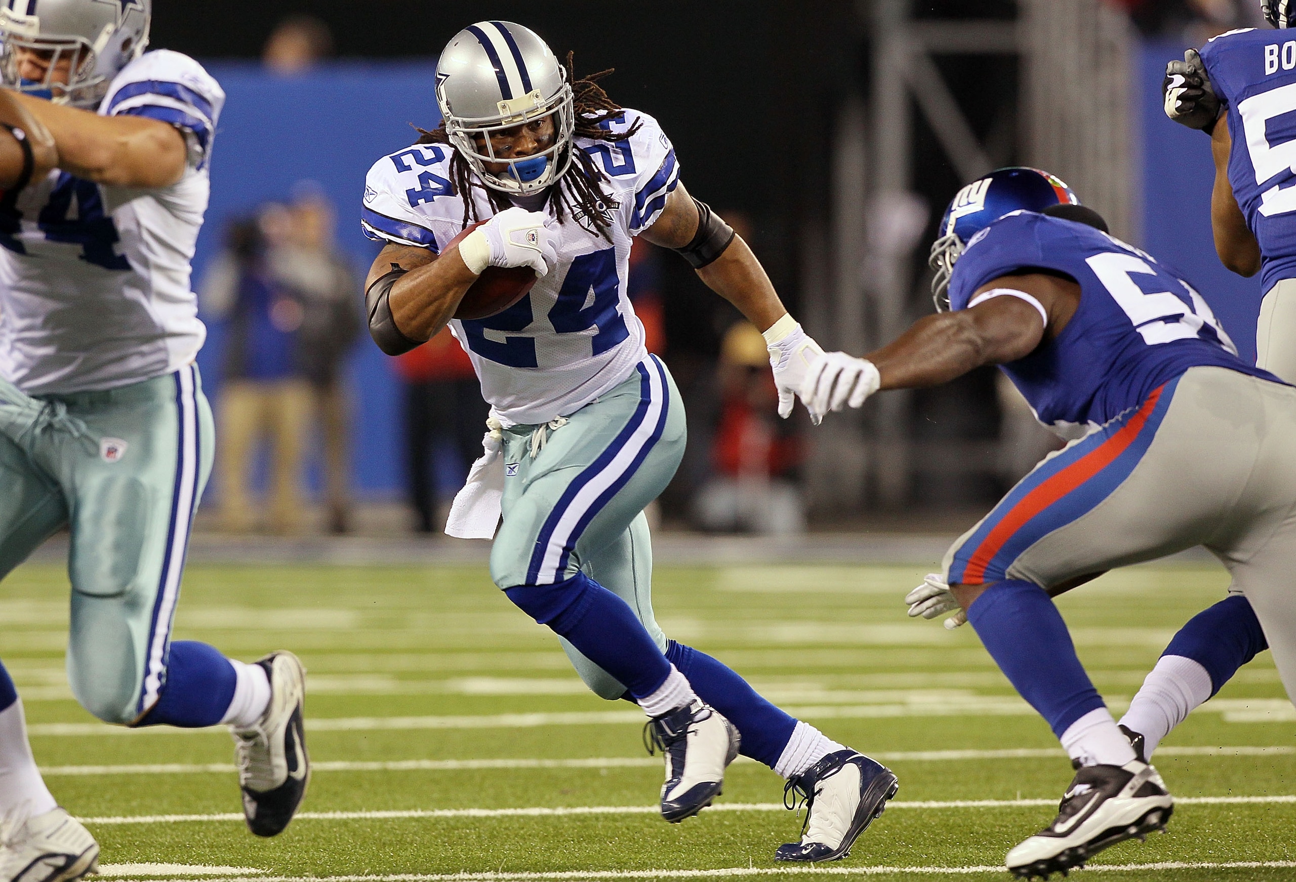 EAST RUTHERFORD, NJ - NOVEMBER 14: Marion Barber #24 of the Dallas Cowboys runs the ball against the New York Giants on November 14, 2010 at the New Meadowlands Stadium in East Rutherford, New Jersey. The Cowboys defeated the Giants 33-20.  (Photo by Jim