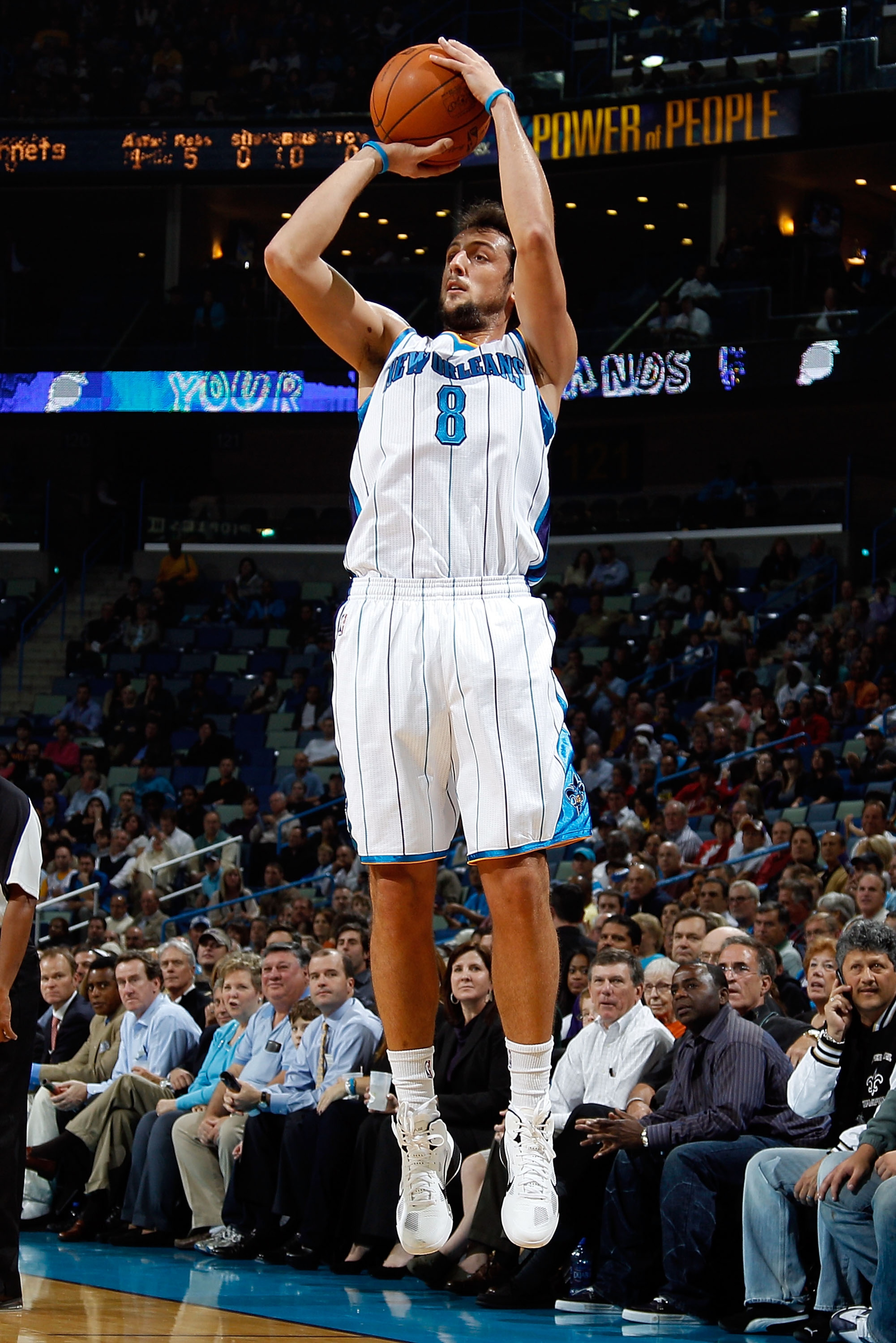 NEW ORLEANS - NOVEMBER 17:  Marco Belinelli #8 of the New Orleans Hornets shoots the ball during the game against  the Dallas Mavericks at the New Orleans Arena on November 17, 2010 in New Orleans, Louisiana.  NOTE TO USER: User expressly acknowledges and