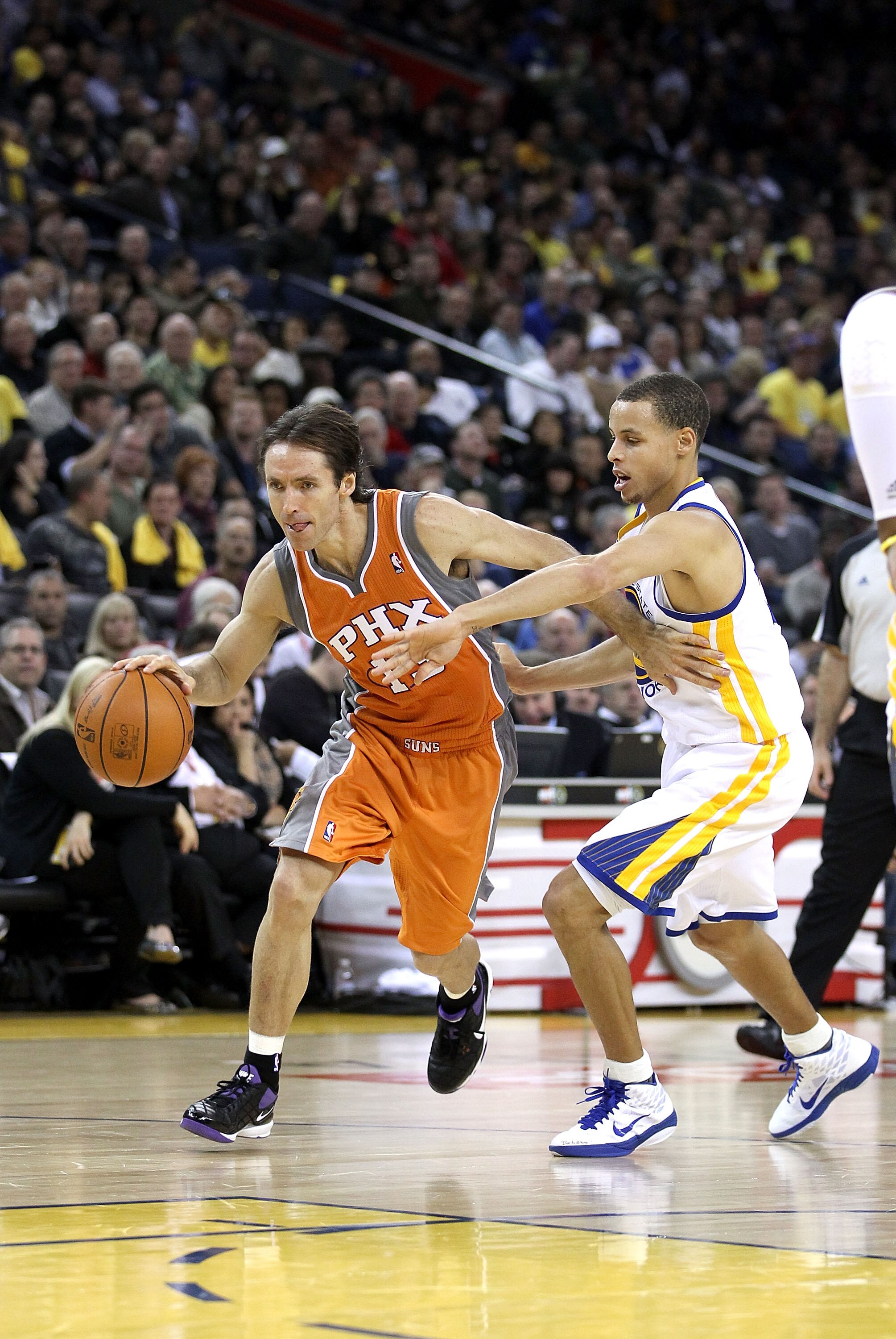 OAKLAND, CA - DECEMBER 02:  Steve Nash #13 of the Phoenix Suns in action against the Golden State Warriors at Oracle Arena on December 2, 2010 in Oakland, California. NOTE TO USER: User expressly acknowledges and agrees that, by downloading and or using t