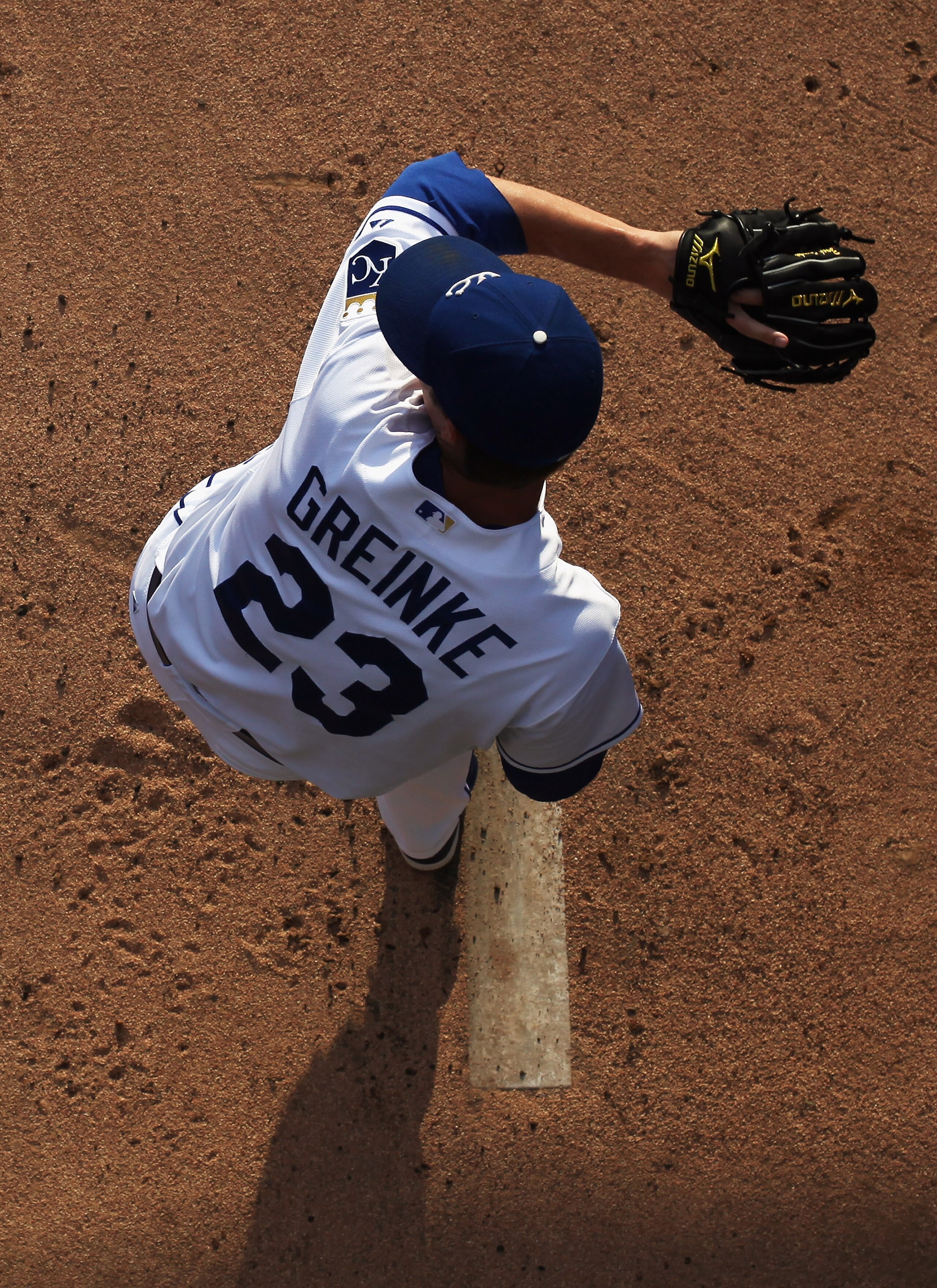 KANSAS CITY, MO - JULY 26:  Starting pitcher Zack Greinke #23 of the Kansas City Royals warms-up prior to the start of the game against the Minnesota Twins on July 26, 2010 at Kauffman Stadium in Kansas City, Missouri.  (Photo by Jamie Squire/Getty Images