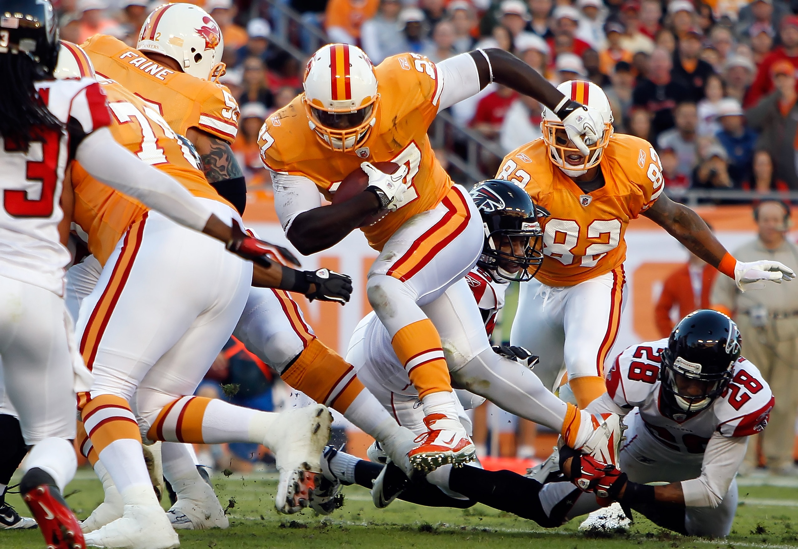 TAMPA, FL - DECEMBER 05:  Running back LeGarrette Blount #27 of the Tampa Bay Buccaneers runs the ball against the Atlanta Falcons during the game at Raymond James Stadium on December 5, 2010 in Tampa, Florida.  (Photo by J. Meric/Getty Images)