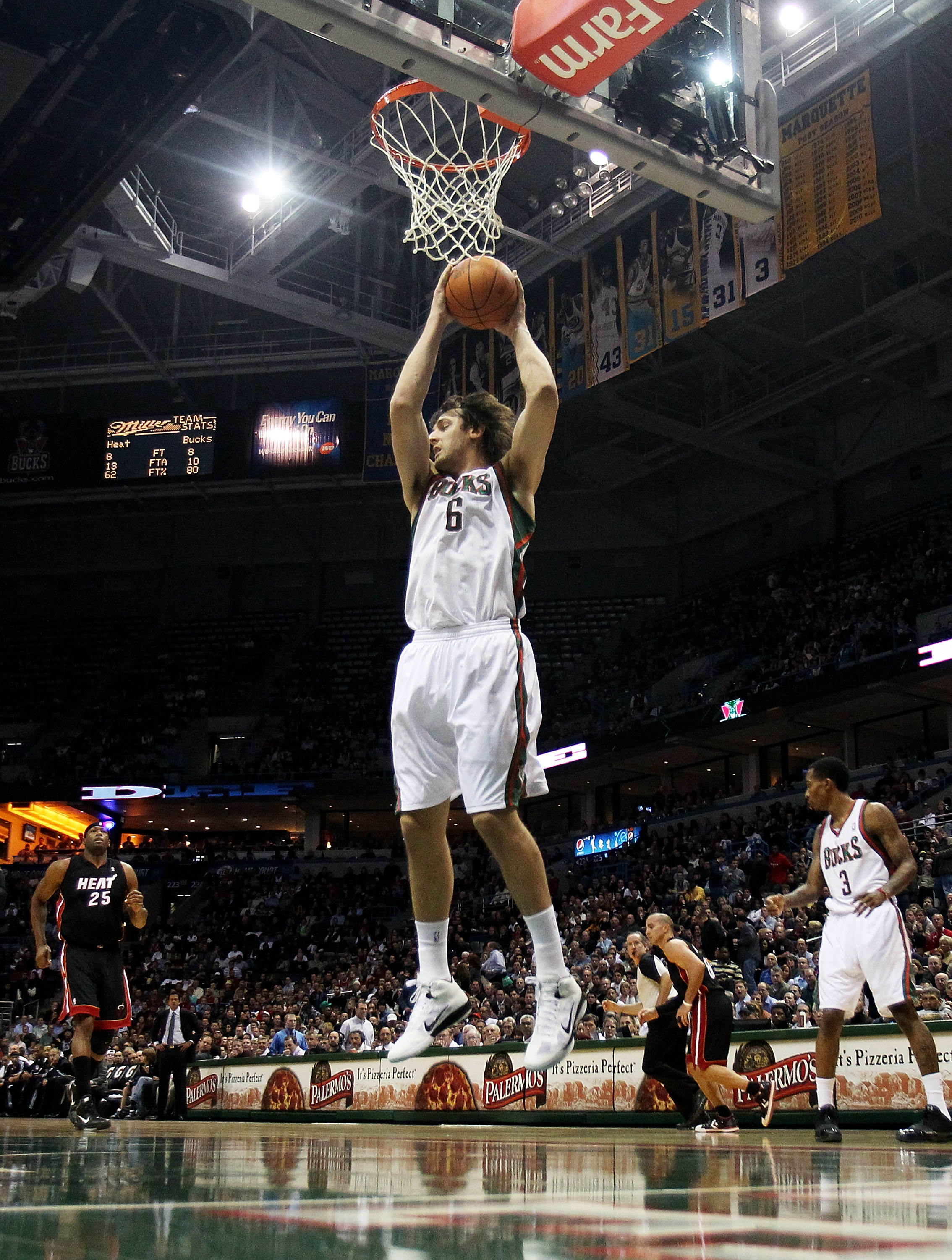 MILWAUKEE, WI - DECEMBER 06: Andrew Bogut #6 of the Milwaukee Bucks grabs a rebound against the Miami Heat at the Bradley Center on December 6, 2010 in Milwaukee, Wisconsin. The Heat defeated the Bucks 88-78. NOTE TO USER: User expressly acknowledges and