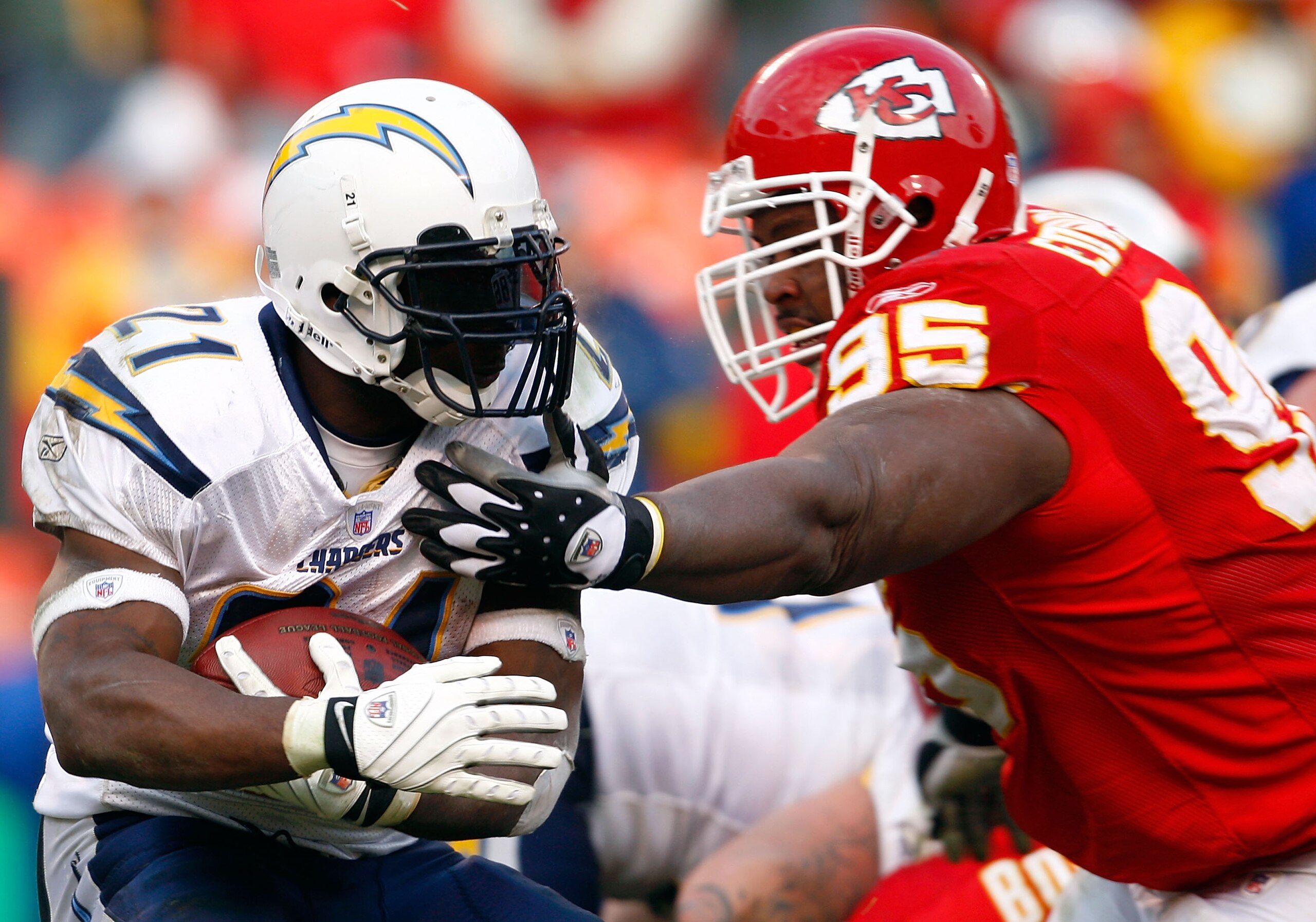 KANSAS CITY, MO - DECEMBER 02: LaDainian Tomlinson #21 of the San Diego Chargers carries the ball as Ron Edwards #95 of the Kansas City Chiefs defends during the game on December 2, 2007 at Arrowhead Stadium in Kansas City, Missouri. (Photo by Jamie Squ KANSAS CITY, MO - DECEMBER 02: LaDainian Tomlinson #21 of the San Diego Chargers carries the ball as Ron Edwards #95 of the Kansas City Chiefs defends during the game on December 2, 2007 at Arrowhead Stadium in Kansas City, Missouri. (Photo by Jamie Squ