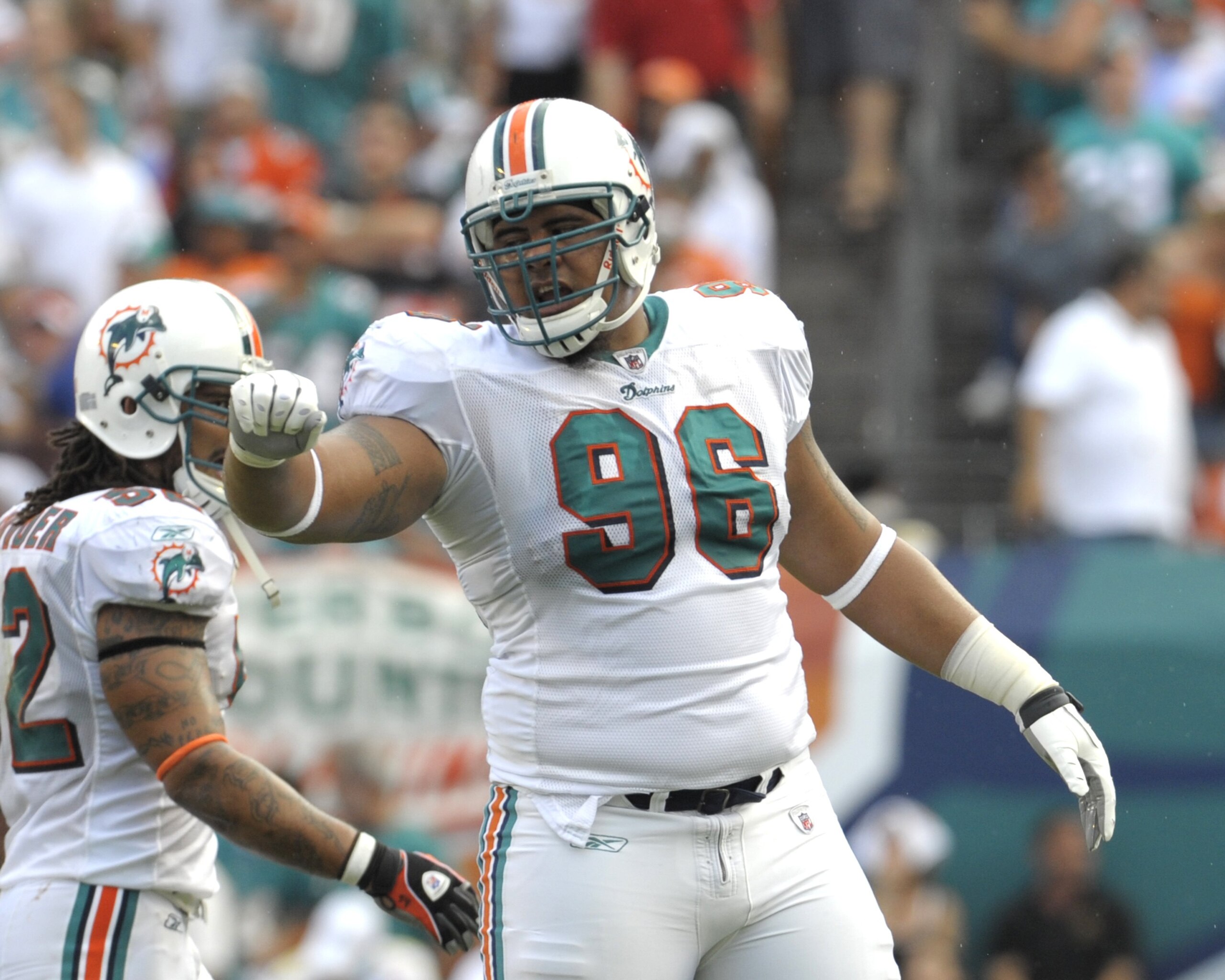 MIAMI, FL - JANUARY 4: Defensive tackle Paul Soliai #96 of the Miami Dolphins sets for play against the Baltimore Ravens in an NFL Wildcard Playoff Game at Dolphins Stadium on January 4, 2009 in Miami, Florida. (Photo by Al Messerschmidt/Getty Images) MIAMI, FL - JANUARY 4: Defensive tackle Paul Soliai #96 of the Miami Dolphins sets for play against the Baltimore Ravens in an NFL Wildcard Playoff Game at Dolphins Stadium on January 4, 2009 in Miami, Florida. (Photo by Al Messerschmidt/Getty Images)