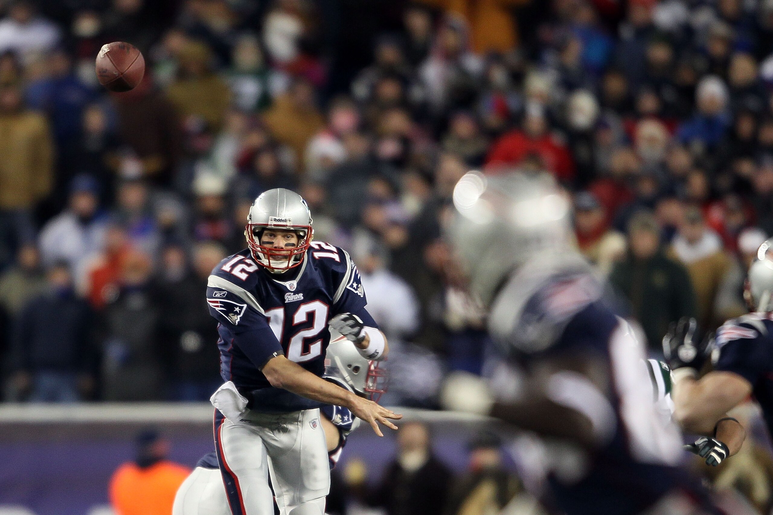 FOXBORO, MA - DECEMBER 06: Tom Brady #12 of the New England Patriots throws a pass to Deion Branch #84 against the New York Jets at Gillette Stadium on December 6, 2010 in Foxboro, Massachusetts. (Photo by Elsa/Getty Images) FOXBORO, MA - DECEMBER 06: Tom Brady #12 of the New England Patriots throws a pass to Deion Branch #84 against the New York Jets at Gillette Stadium on December 6, 2010 in Foxboro, Massachusetts. (Photo by Elsa/Getty Images)