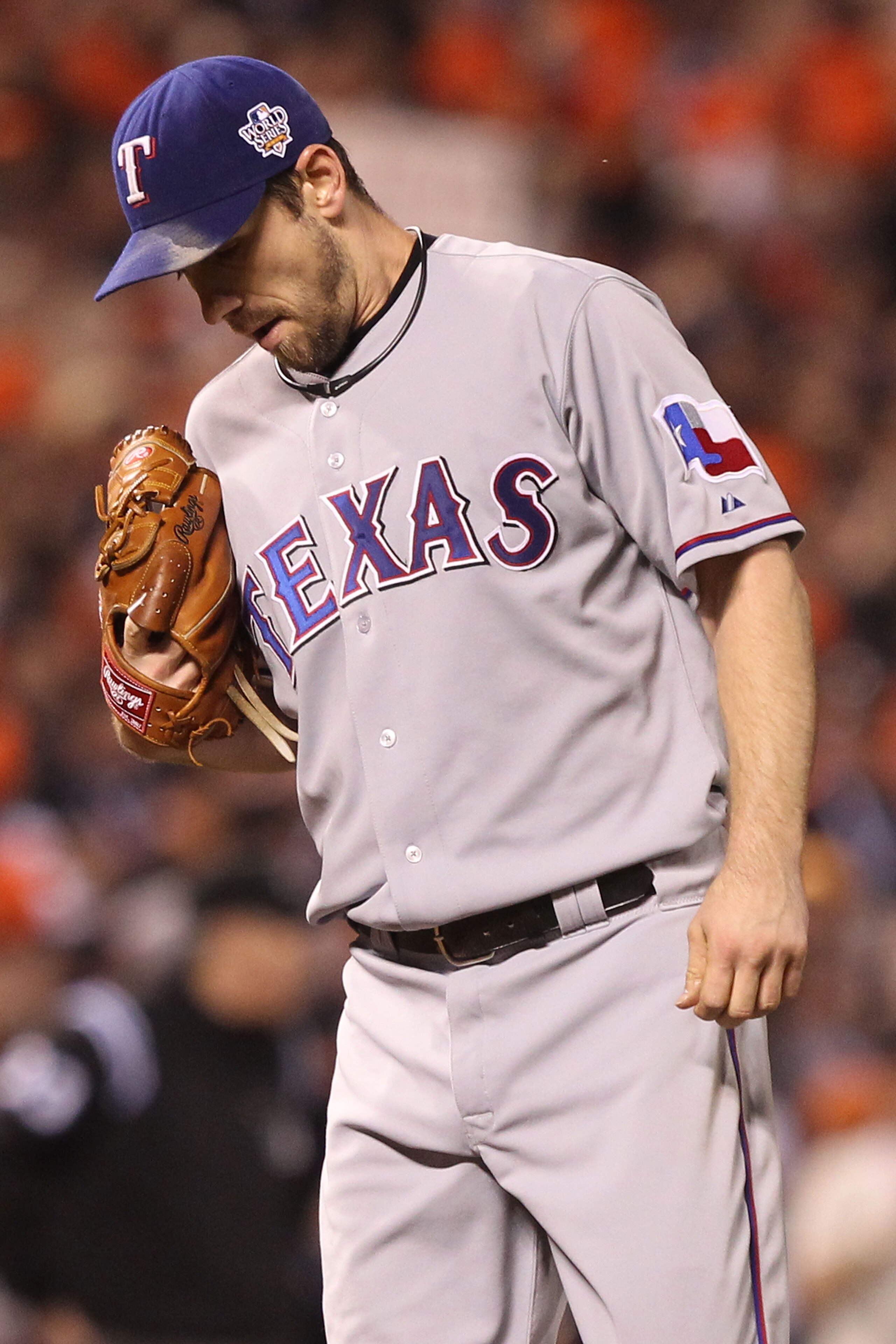 SAN FRANCISCO - OCTOBER 27:  Cliff Lee #33 of the Texas Rangers looks on against the San Francisco Giants in Game One of the 2010 MLB World Series at AT&T Park on October 27, 2010 in San Francisco, California.  (Photo by Jed Jacobsohn/Getty Images)