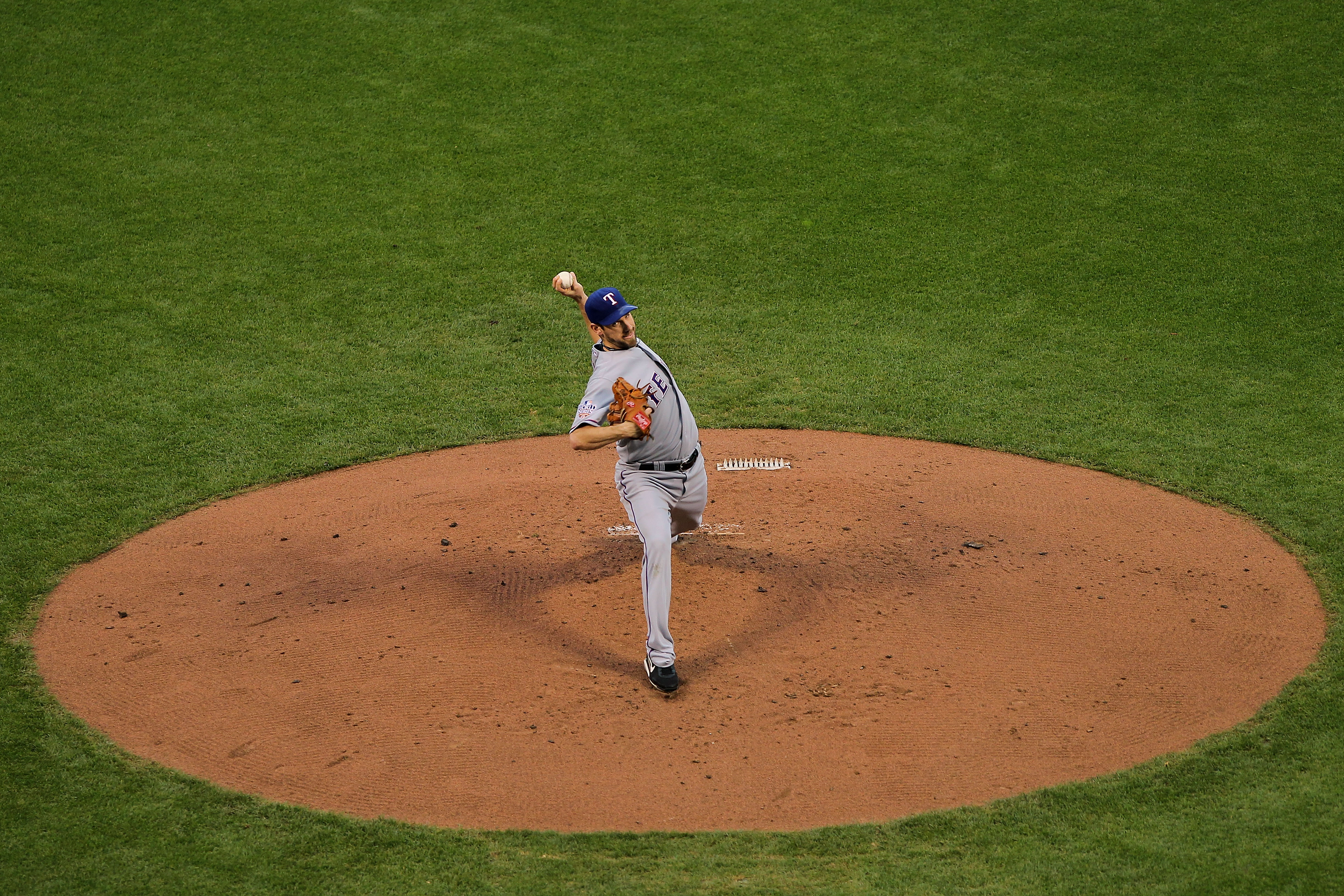 SAN FRANCISCO - OCTOBER 27:  Cliff Lee #33 of the Texas Rangers pitches against the San Francisco Giants in Game One of the 2010 MLB World Series at AT&T Park on October 27, 2010 in San Francisco, California.  (Photo by Doug Pensinger/Getty Images)