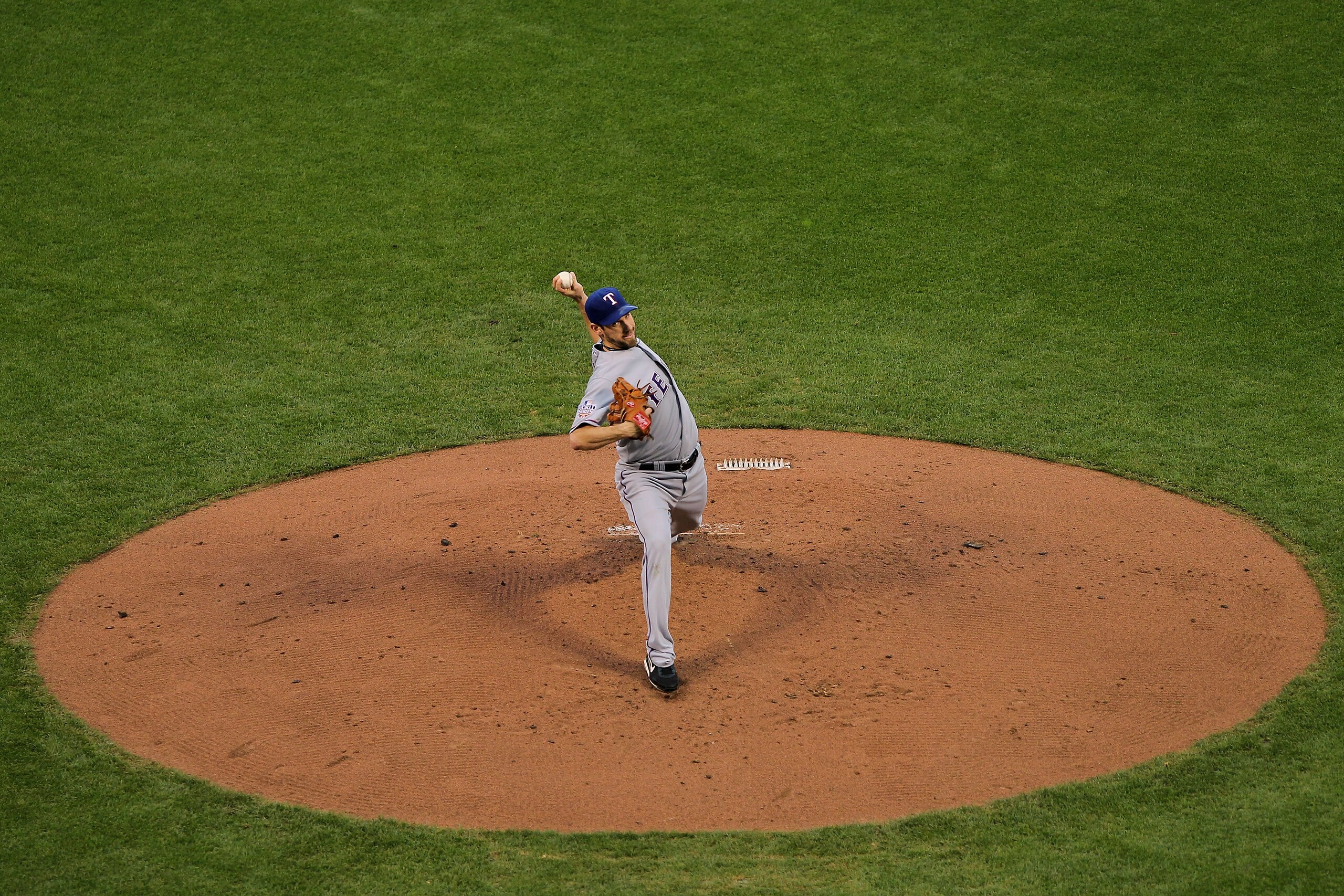 SAN FRANCISCO - OCTOBER 27:  Cliff Lee #33 of the Texas Rangers pitches against the San Francisco Giants in Game One of the 2010 MLB World Series at AT&T Park on October 27, 2010 in San Francisco, California.  (Photo by Doug Pensinger/Getty Images)